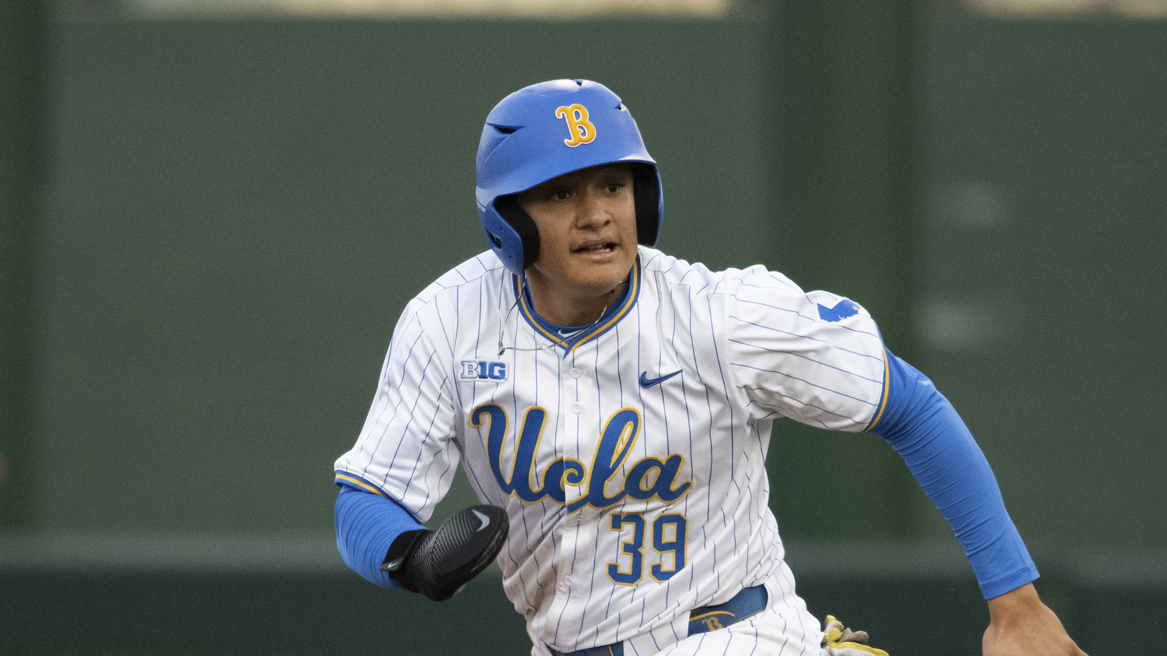 FILE - UCLA's Mulivai Levu (39) runs during an NCAA baseball game against BYU on Feb. 18, 2025, in Los Angeles.