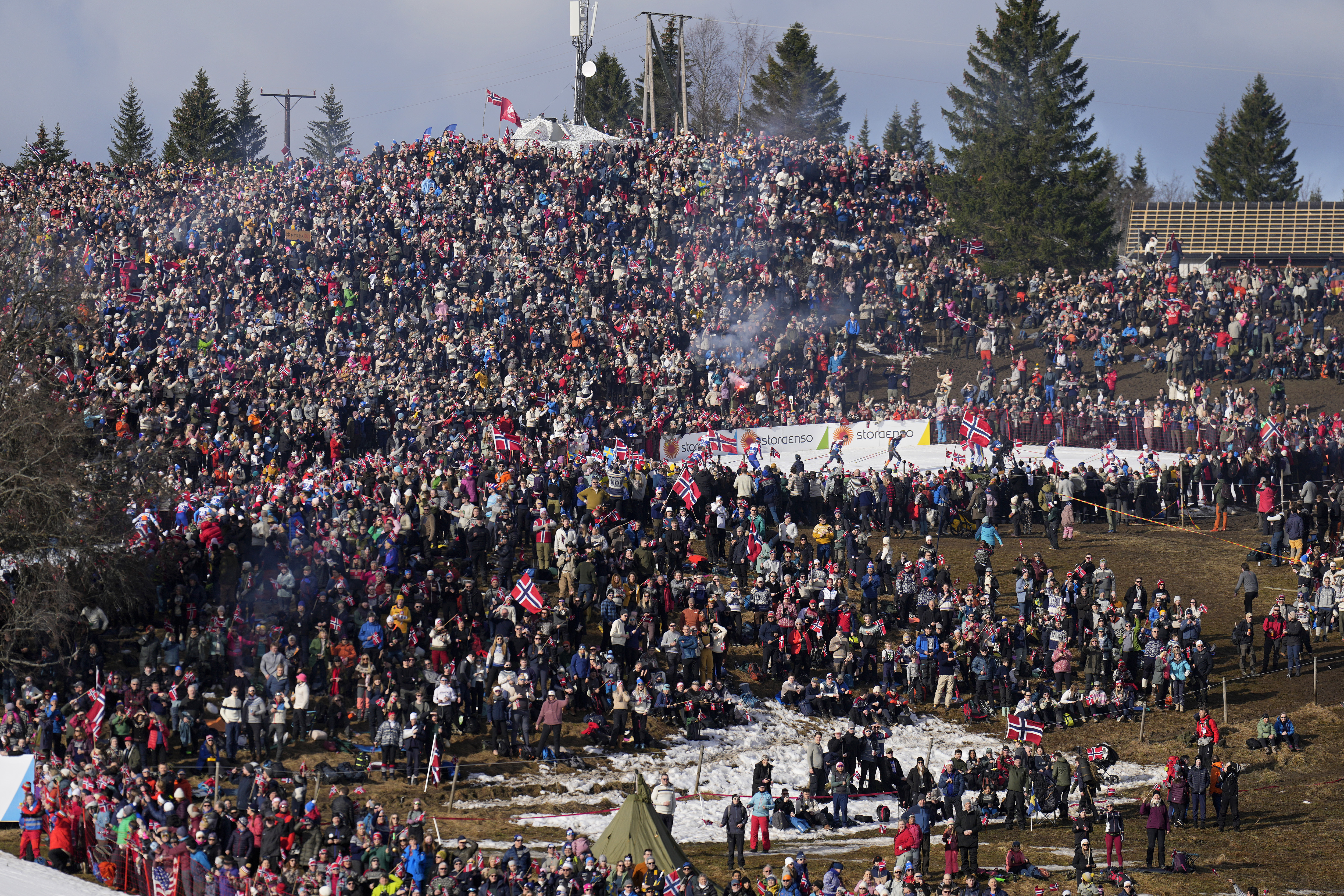 Tens of thousands of fans watch athletes compete in the cross-country men's mass start 50 Km at the Nordic World Ski Championships in Trondheim, Norway, Saturday, March 8, 2025.