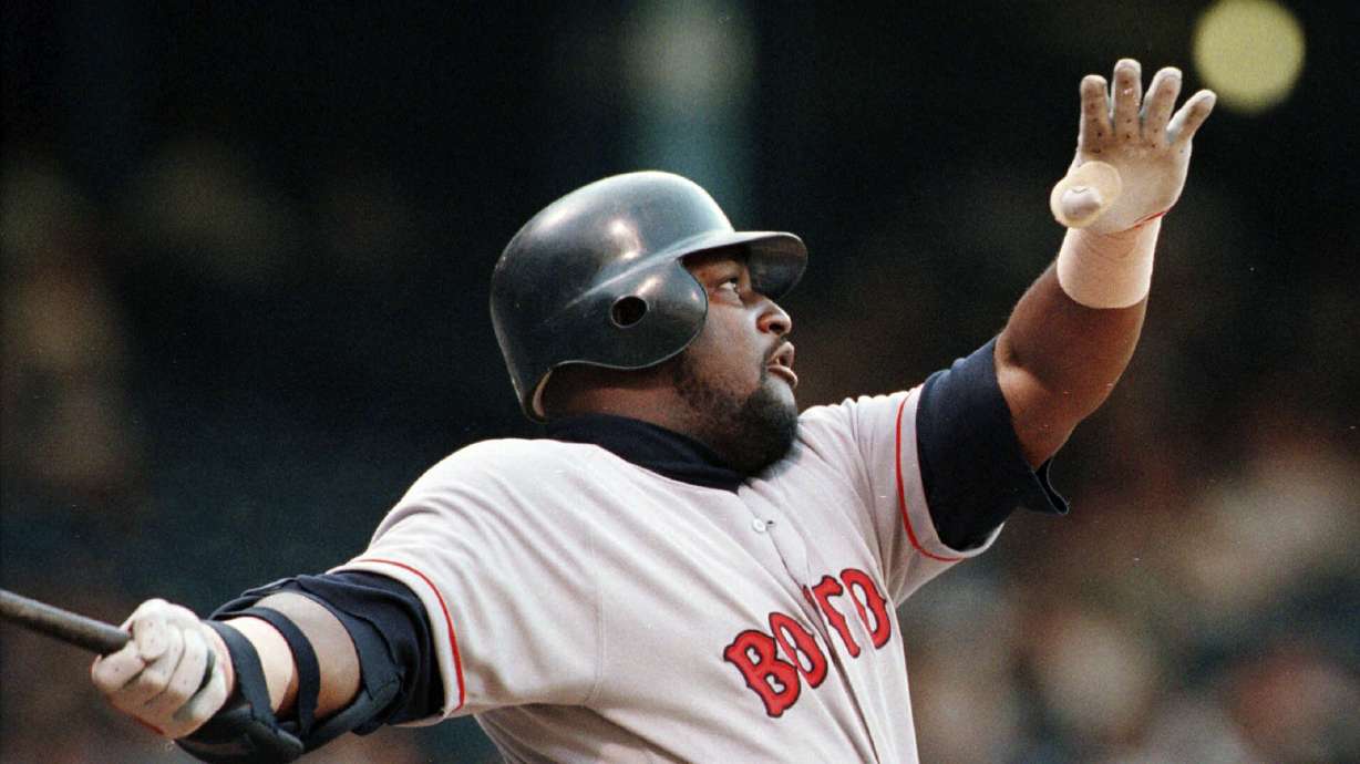 FILE - Boston Red Sox' Mo Vaughn follows through on his second inning home run, July 18, 1998 against the Detroit Tigers at Tiger Stadium.
