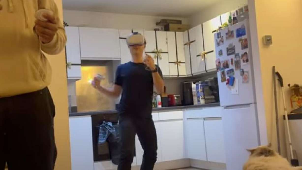 Virtual reality can cause real-life pain, as seen in this Feb. 7 video from a London flat.