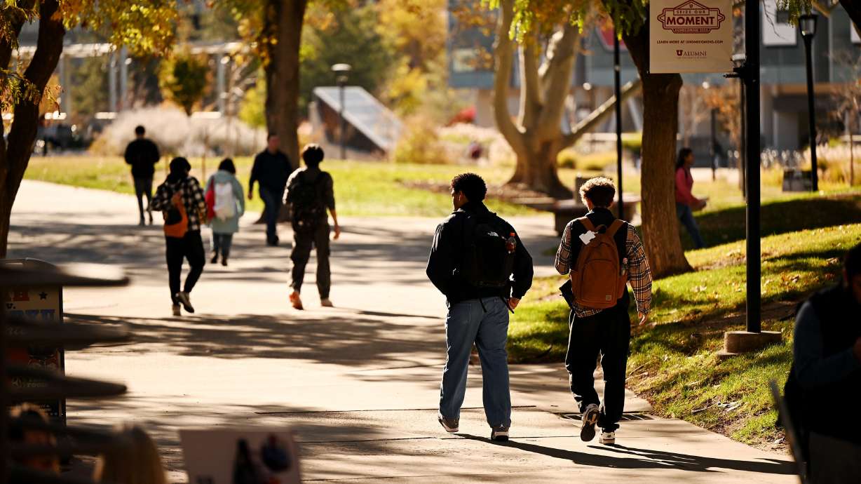 University of Utah students walk around the campus on Nov. 11, 2024. Polls indicate Utahns have far more confidence in Utah colleges than schools outside the state's borders.