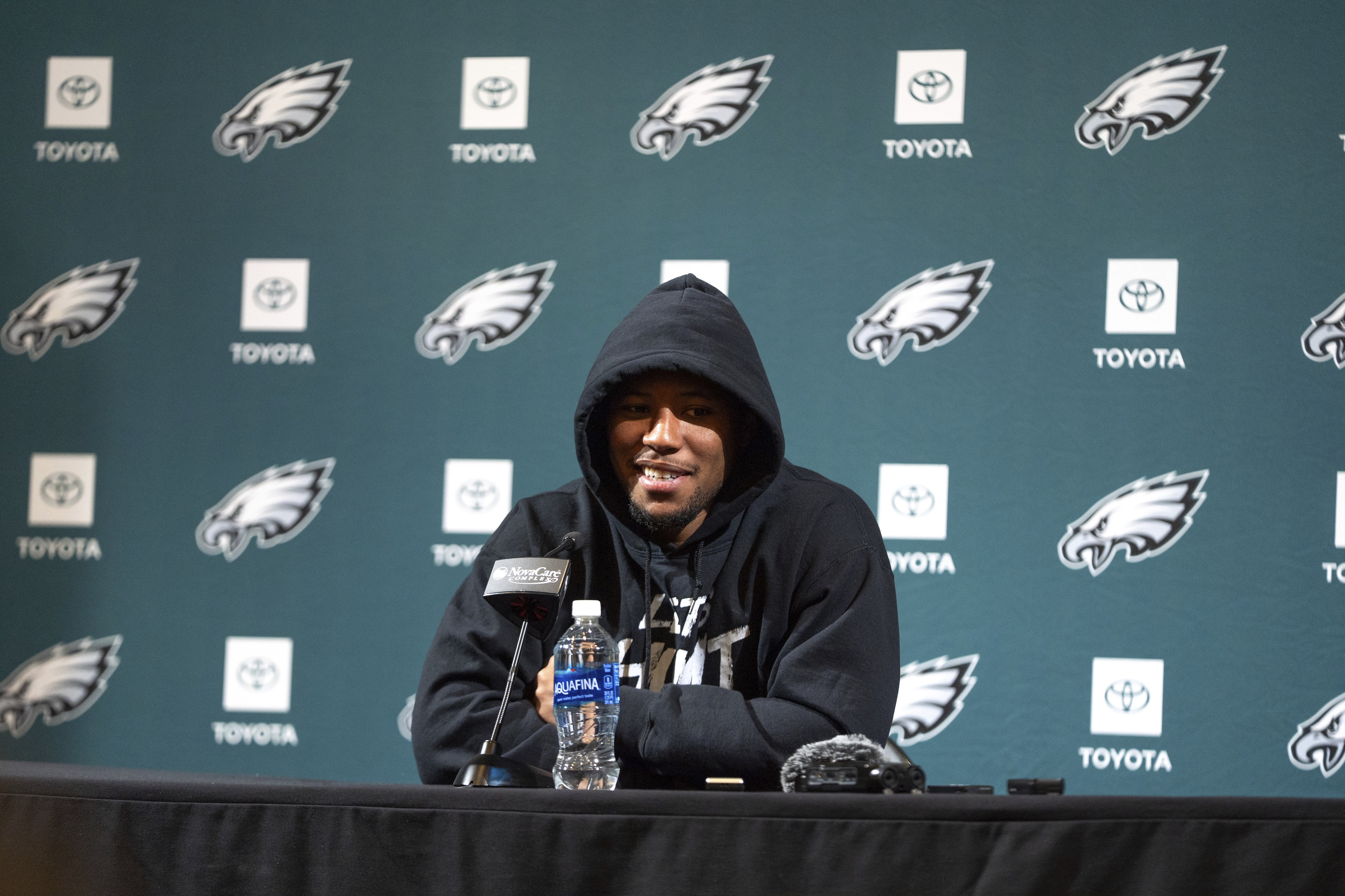 Philadelphia Eagles running back Saquon Barkley speaks with the media during a news conference at the NFL football team's training facility after signing a contract extension Monday, March 10, 2025, in Philadelphia. 