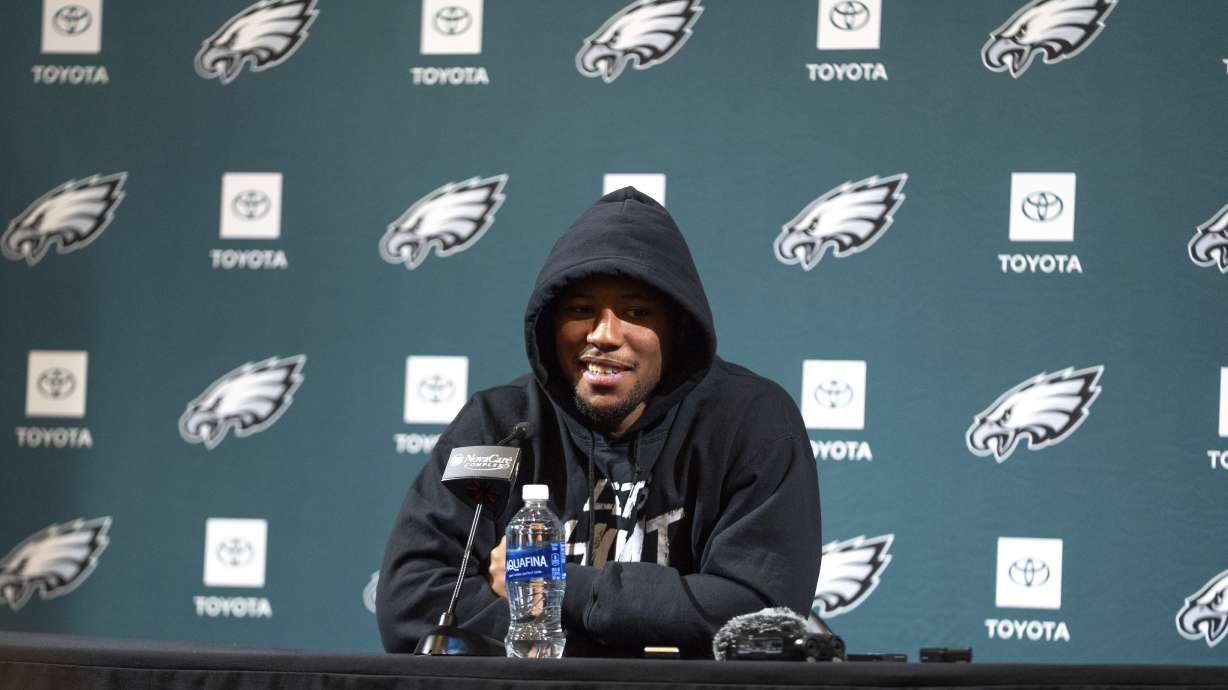 Philadelphia Eagles running back Saquon Barkley speaks with the media during a news conference at the NFL football team's training facility after signing a contract extension Monday, March 10, 2025, in Philadelphia.