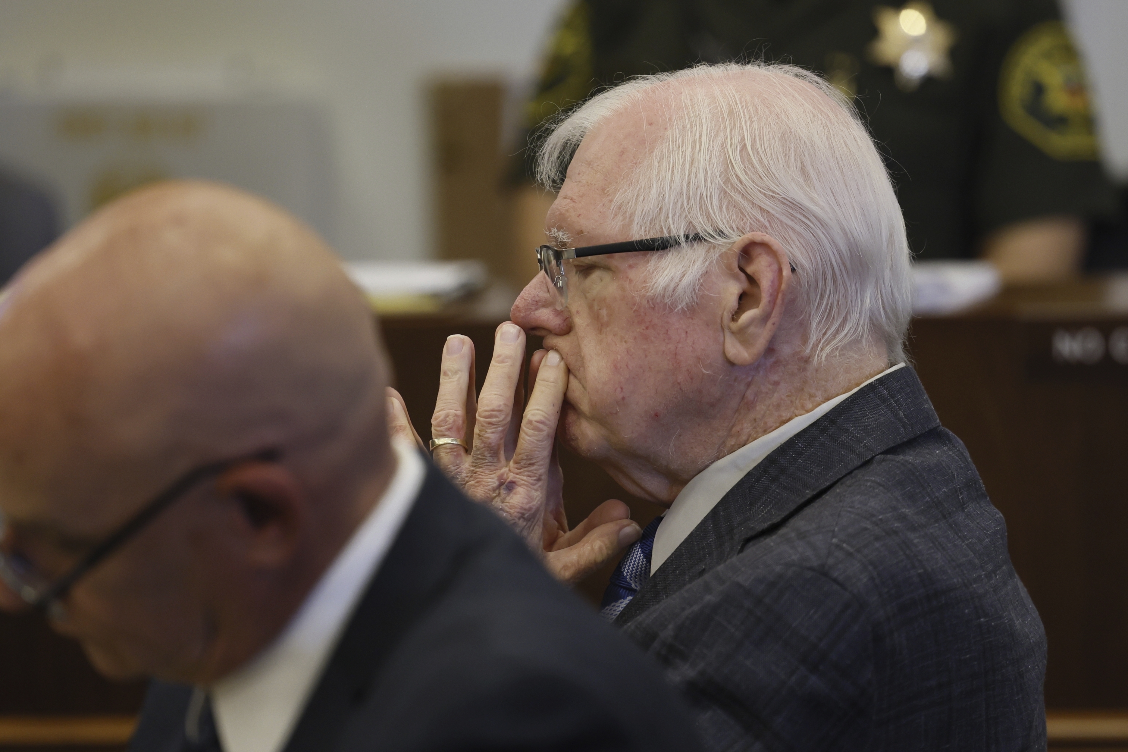 Judge Jeffrey Ferguson listens during his trial at the Santa Ana Central Justice Center, Feb. 26 in Santa Ana, Calif. The case of a Southern California judge charged with murder in his wife's fatal shooting has ended in a mistrial.