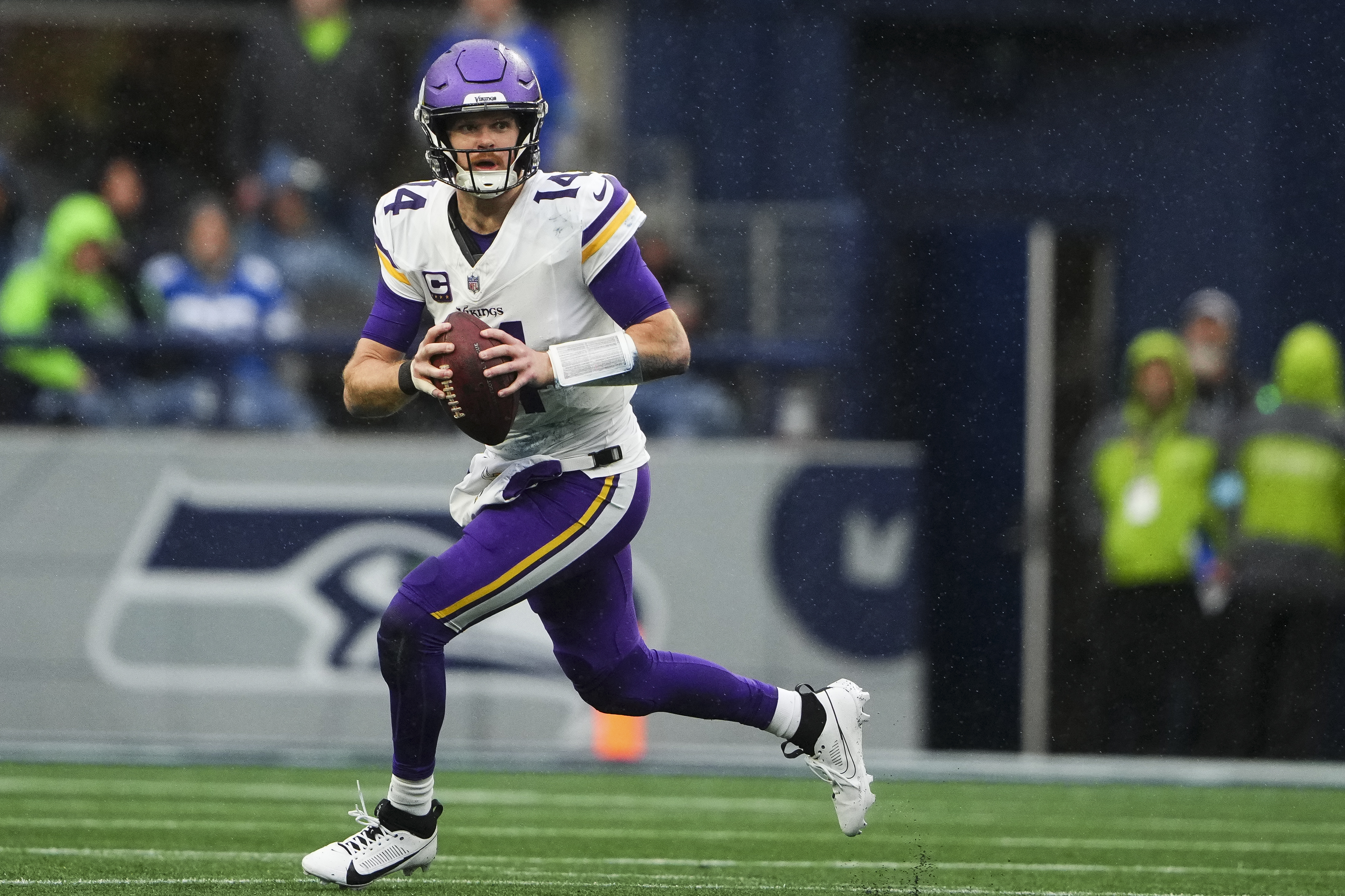 FILE - Minnesota Vikings quarterback Sam Darnold looks to pass during an NFL football game against the Seattle Seahawks, Sunday, Dec. 22, 2024, in Seattle.