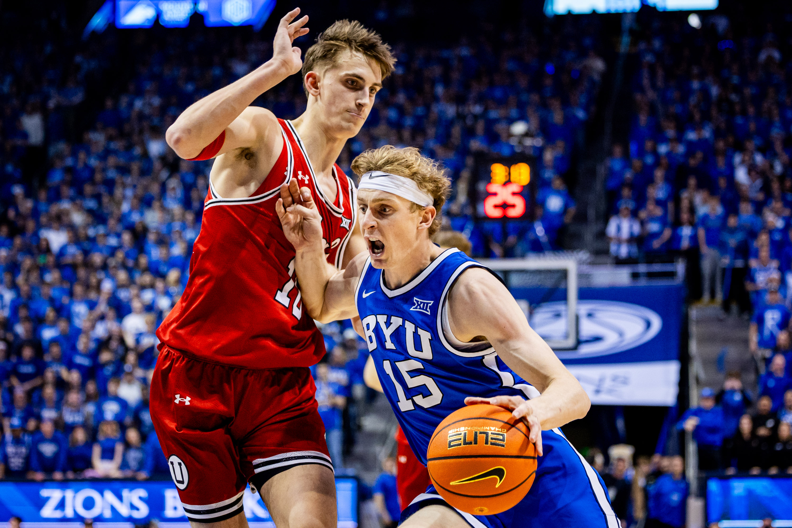 Brigham Young forward Richie Saunders (15) drives the ball toward the basket during a basketball game against the Utah Utes at the Marriott Center at Brigham Young University in Provo on Saturday, March 8, 2025.