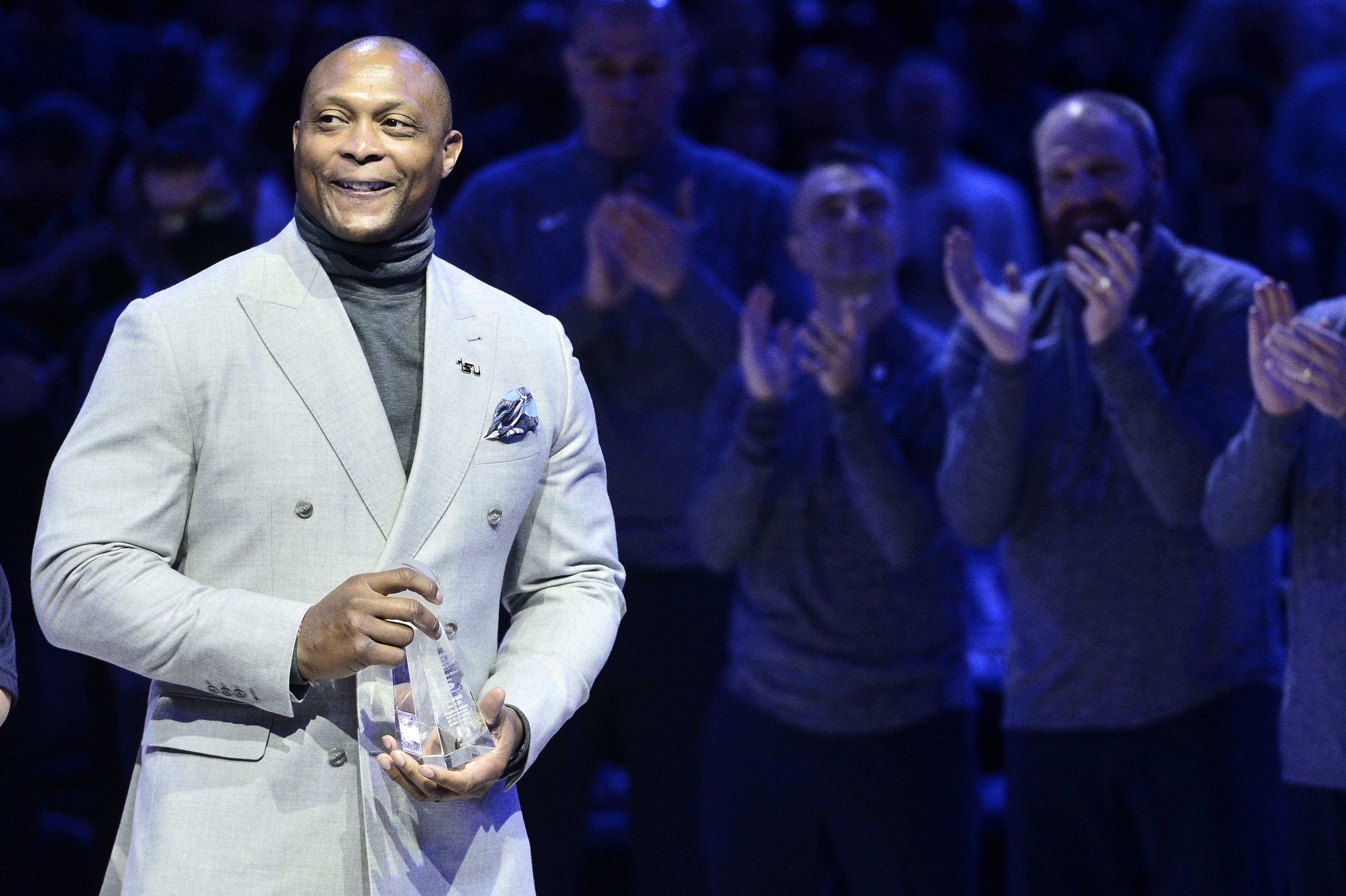 FILE - Eddie George accepts the 18th annual National Civil Rights Museum Sports Legacy Award along with fellow honorees Gary Payton, Luol Deng, and Nancy Leiberman before the 21st annual Martin Luther King Jr. Day Celebration Game between the Phoenix Suns and the Memphis Grizzlies, Monday, Jan. 16, 2023, in Memphis, Tenn.