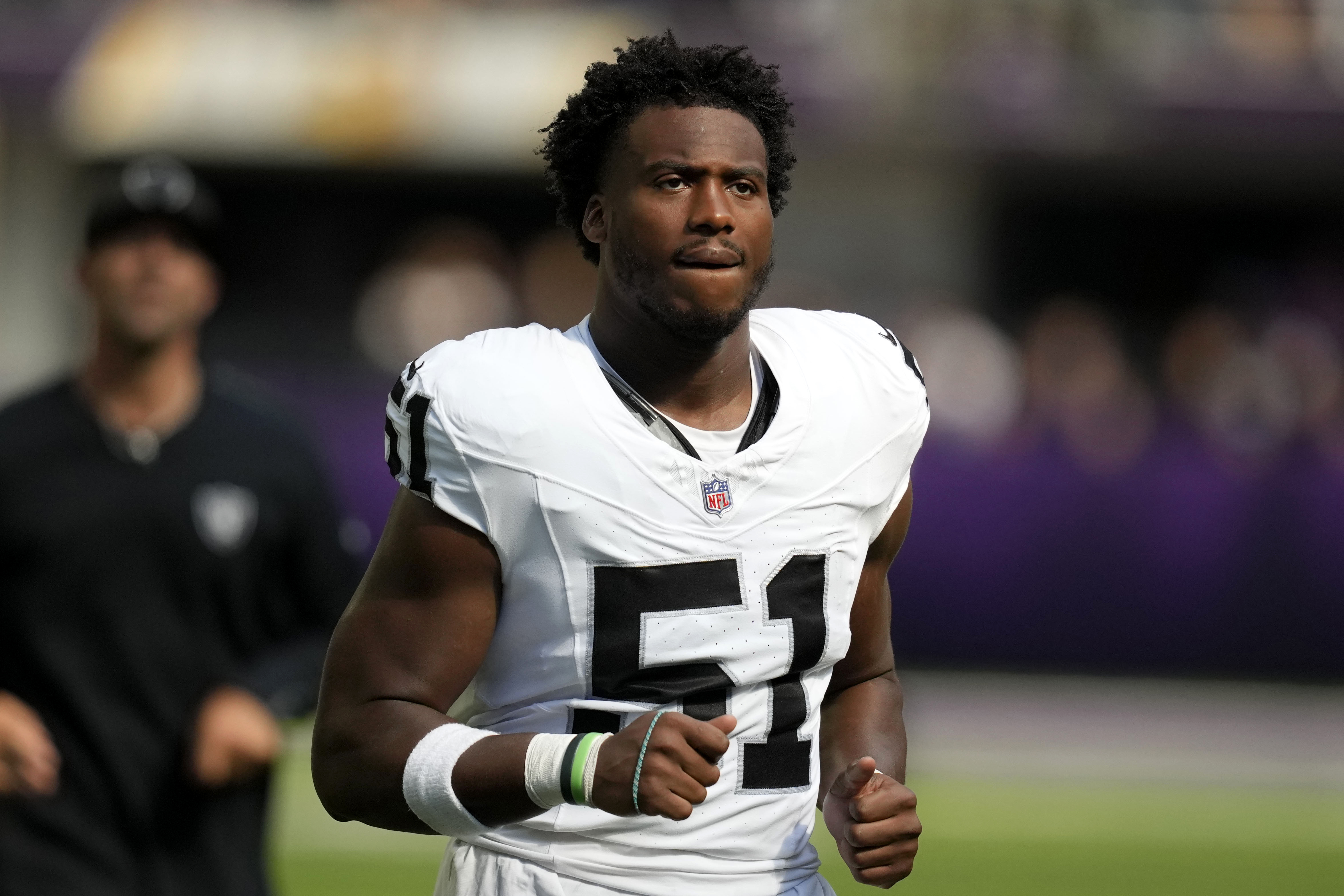 FILE - Las Vegas Raiders defensive end Malcolm Koonce (51) runs off the field at halftime of an NFL preseason football game against the Minnesota Vikings, Aug. 10, 2024, in Minneapolis. 