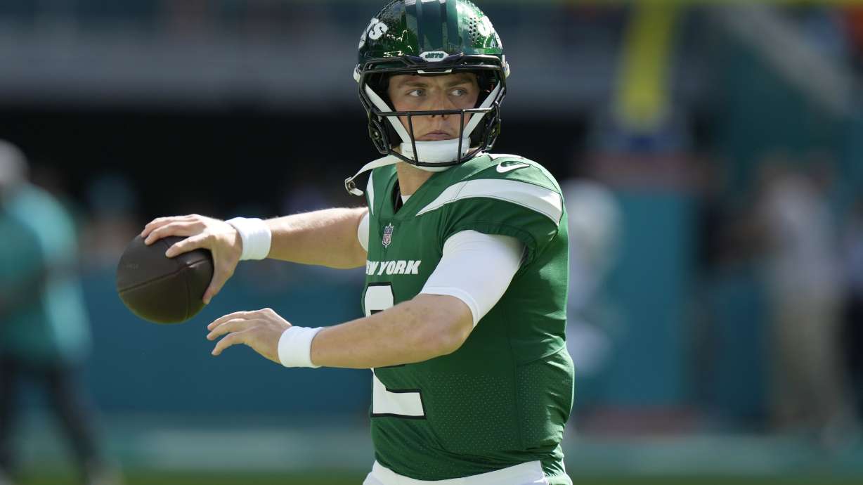 FILE - New York Jets quarterback Zach Wilson (2) warms up before an NFL football game against the Miami Dolphins, Dec. 17, 2023, in Miami Gardens, Fla.