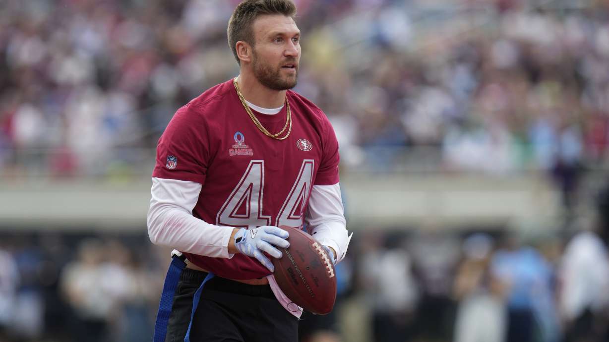 FILE - NFC fullback Kyle Juszczyk, of the San Francisco 49ers, looks to the stands after scoring a touchdown during the flag football event at the NFL Pro Bowl, Feb. 2, 2025, in Orlando.