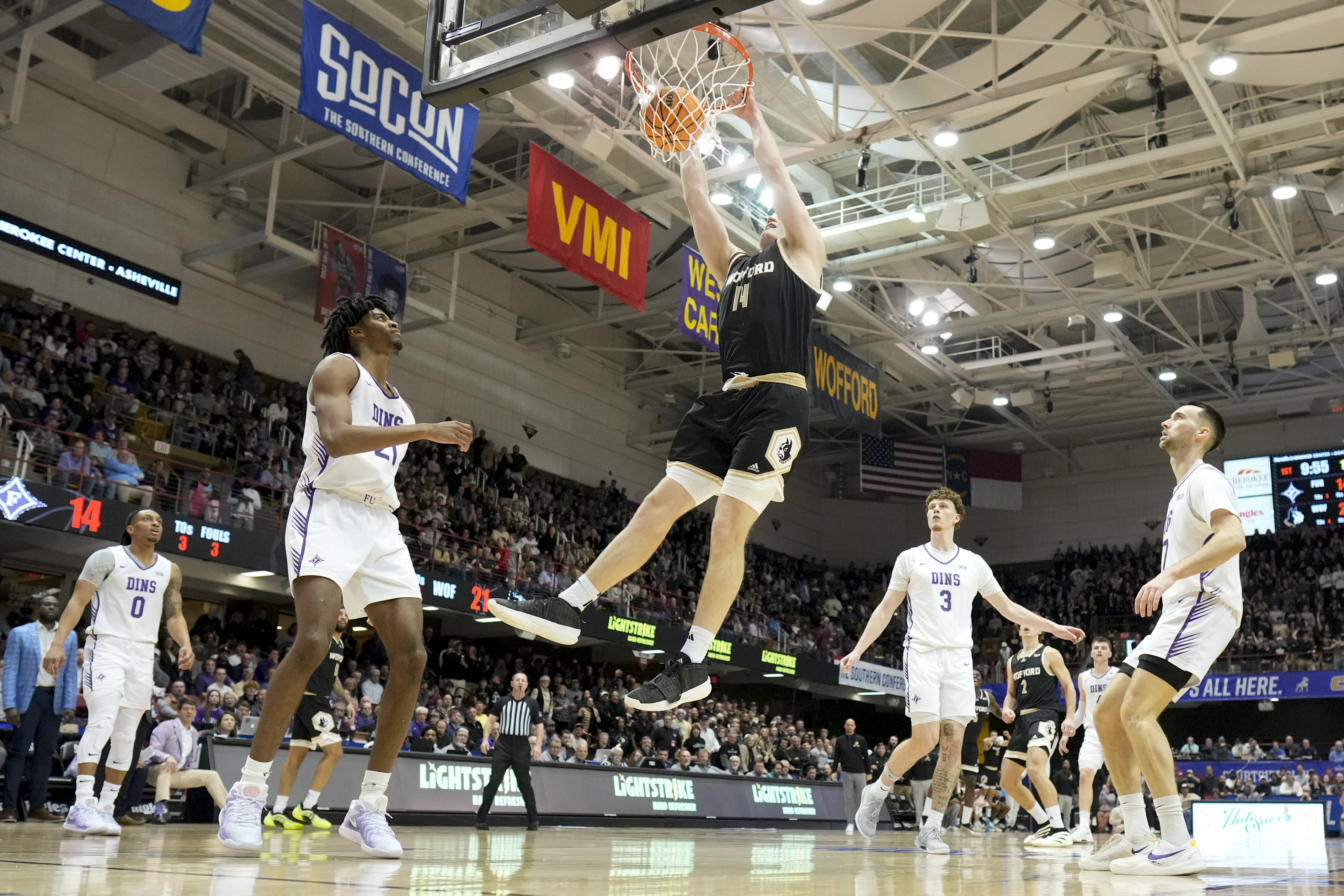 Wofford center Kyler Filewich dunks against Furman during the first half of an college basketball championship game at the Southern Conference tournament, Monday, March 10, 2025, in Asheville, N.C. 