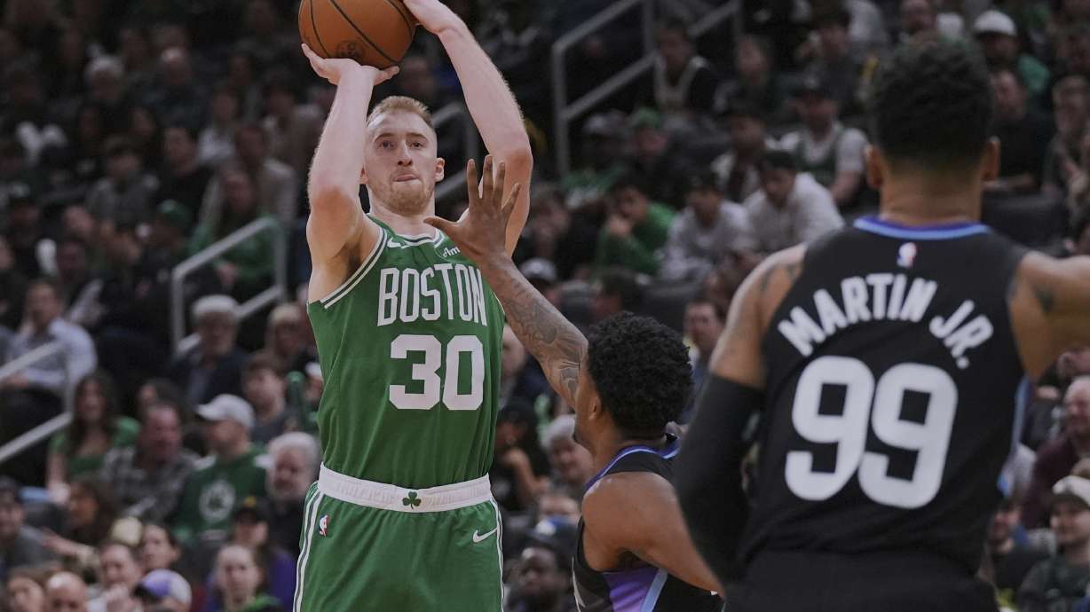 Boston Celtics forward Sam Hauser (30) takes a 3-point shot against the Utah Jazz during the second half of an NBA basketball game, Monday, March 10, 2025, in Boston.