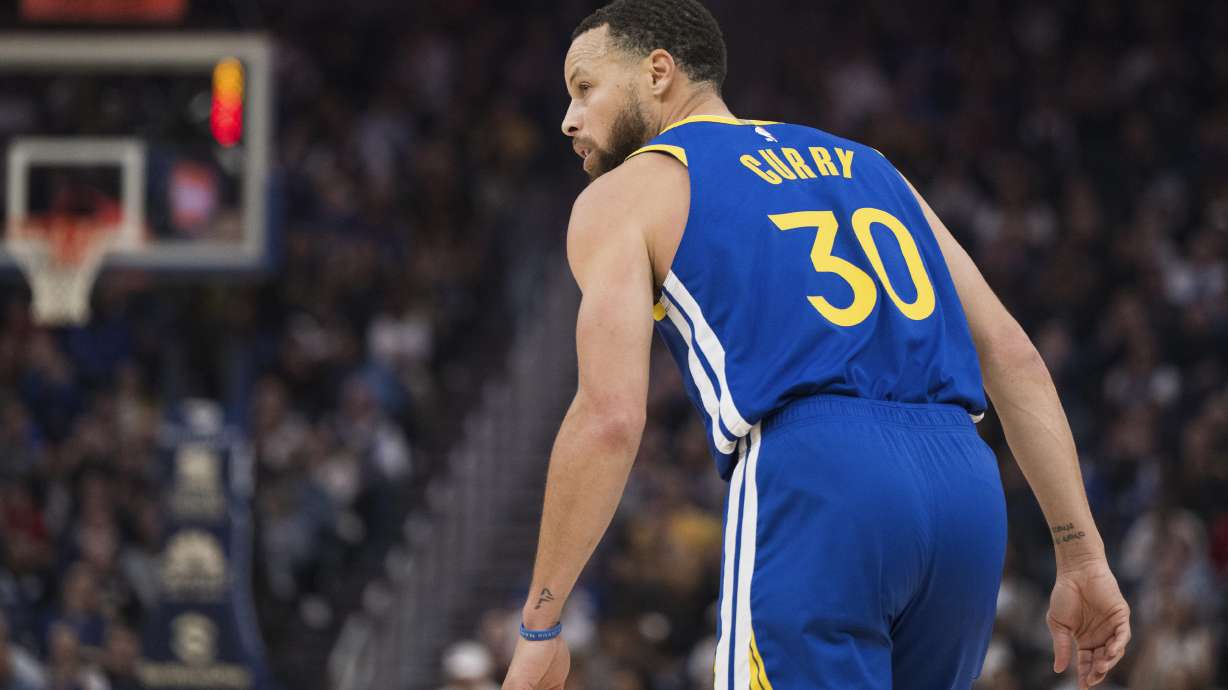 Golden State Warriors guard Stephen Curry looks on during the first half of an NBA basketball game against the Portland Trail Blazers in San Francisco, Monday, March 10, 2025.