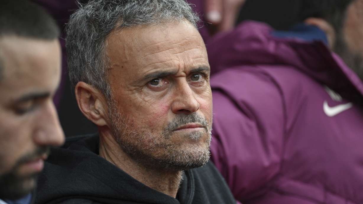 PSG's head coach Luis Enrique sits on the bench prior to the French League One soccer match between Rennes and Paris Saint-Germain at Roazhon Park stadium in Rennes, France, Saturday March 8, 2025.