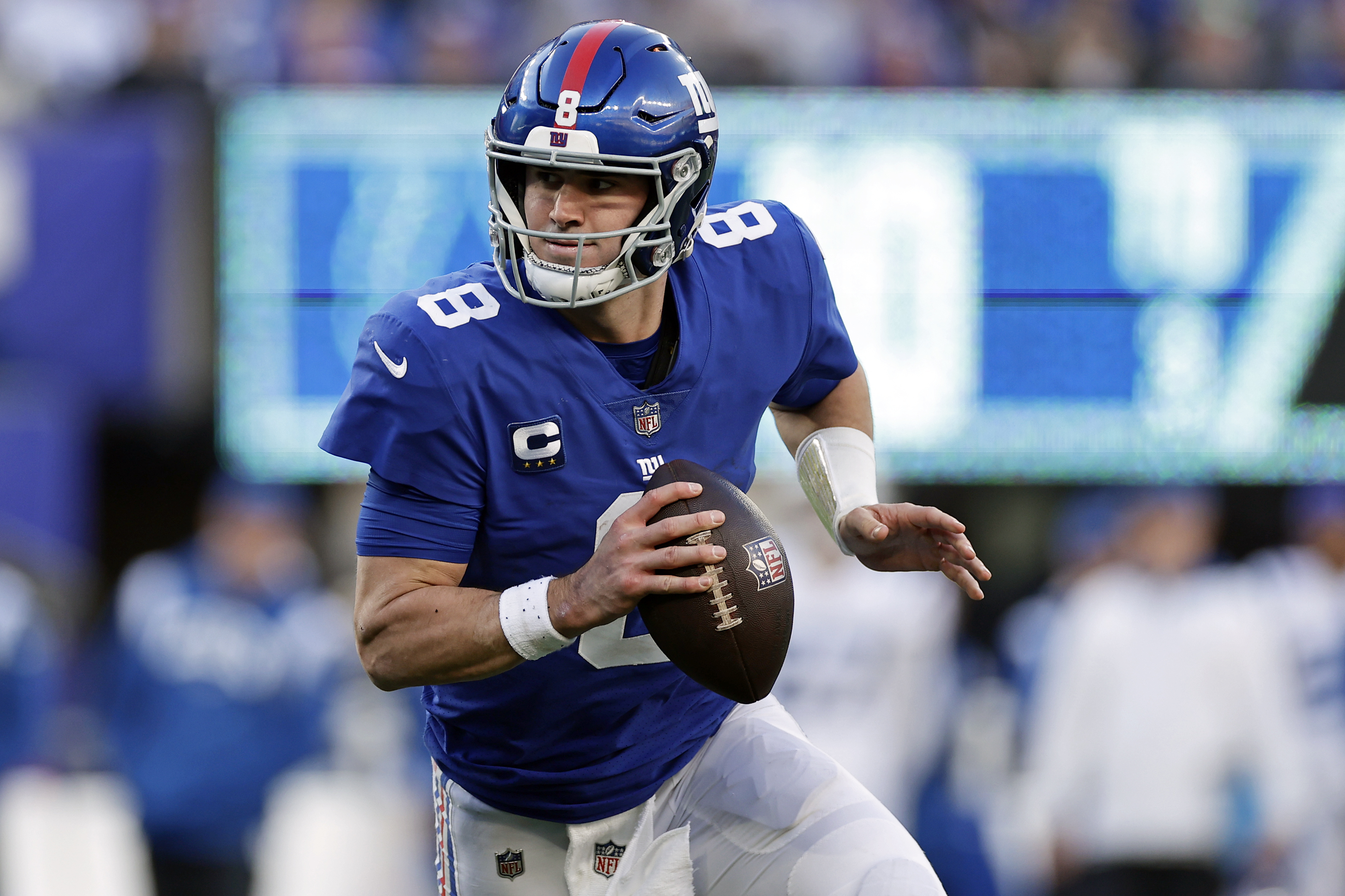 FILE - New York Giants quarterback Daniel Jones runs with the ball against the Indianapolis Colts during an NFL football game, Jan. 1, 2023, in East Rutherford, N.J. 