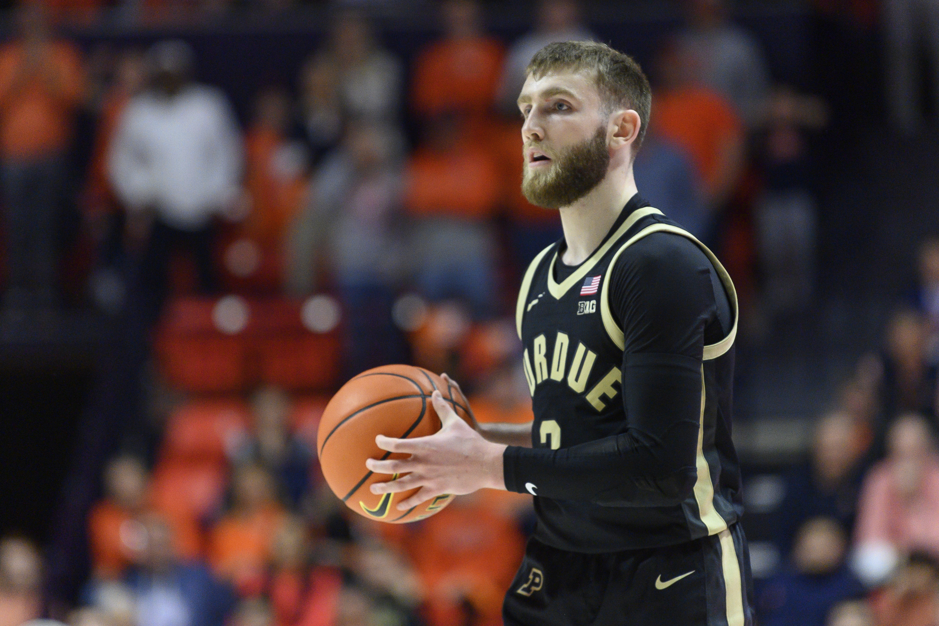 Purdue's Braden Smith looks to pass during an NCAA college basketball game against Illinois, Friday, March 7, 2025, in Champaign, Ill. 