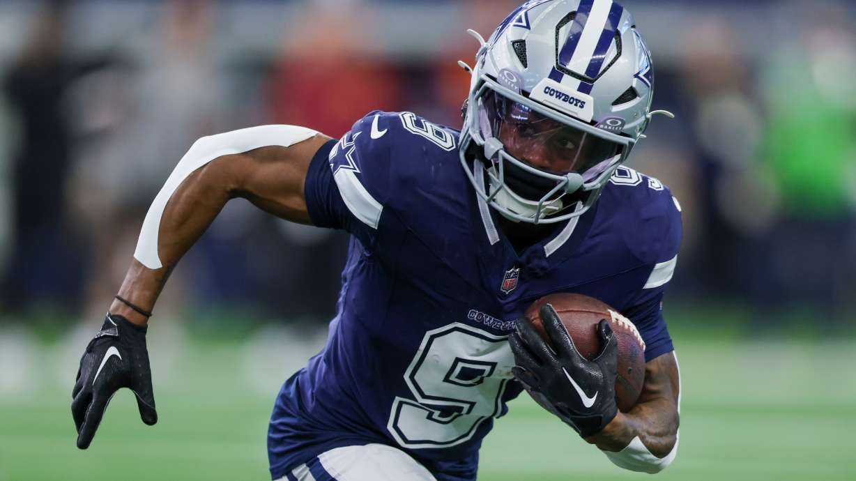 FILE - Dallas Cowboys wide receiver KaVontae Turpin runs after making a catch during the second half of an NFL football game against the Washington Commanders, Sunday, Jan. 5, 2025, in Arlington, Texas. )