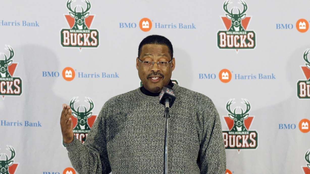 FILE - Former Milwaukee Bucks player Junior Bridgeman talks to the media before an NBA basketball game between the Bucks and Brooklyn Nets, March 1, 2014, in Milwaukee.