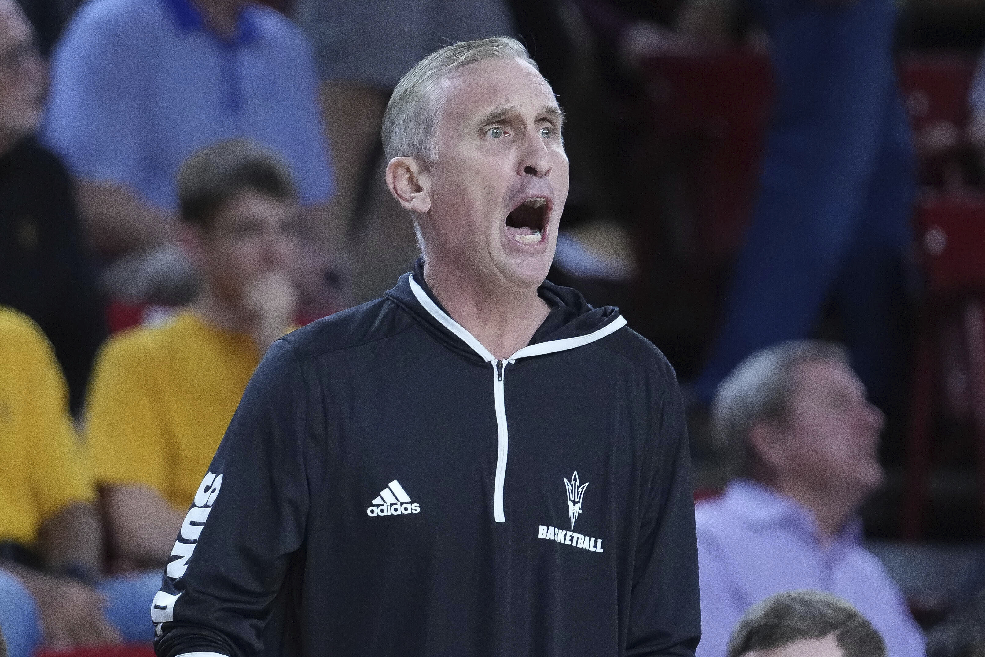 Arizona State head coach Bobby Hurley calls out to his team during the first half of an NCAA college basketball game against BYU, Wednesday, Feb. 26, 2025, in Tempe, Ariz.