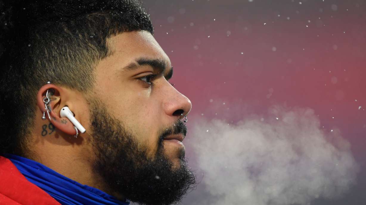FILE - Buffalo Bills running back Ty Johnson warms up before playing against the Baltimore Ravens in an NFL divisional playoff football game, Sunday, Jan. 19, 2025, in Orchard Park, N.Y.