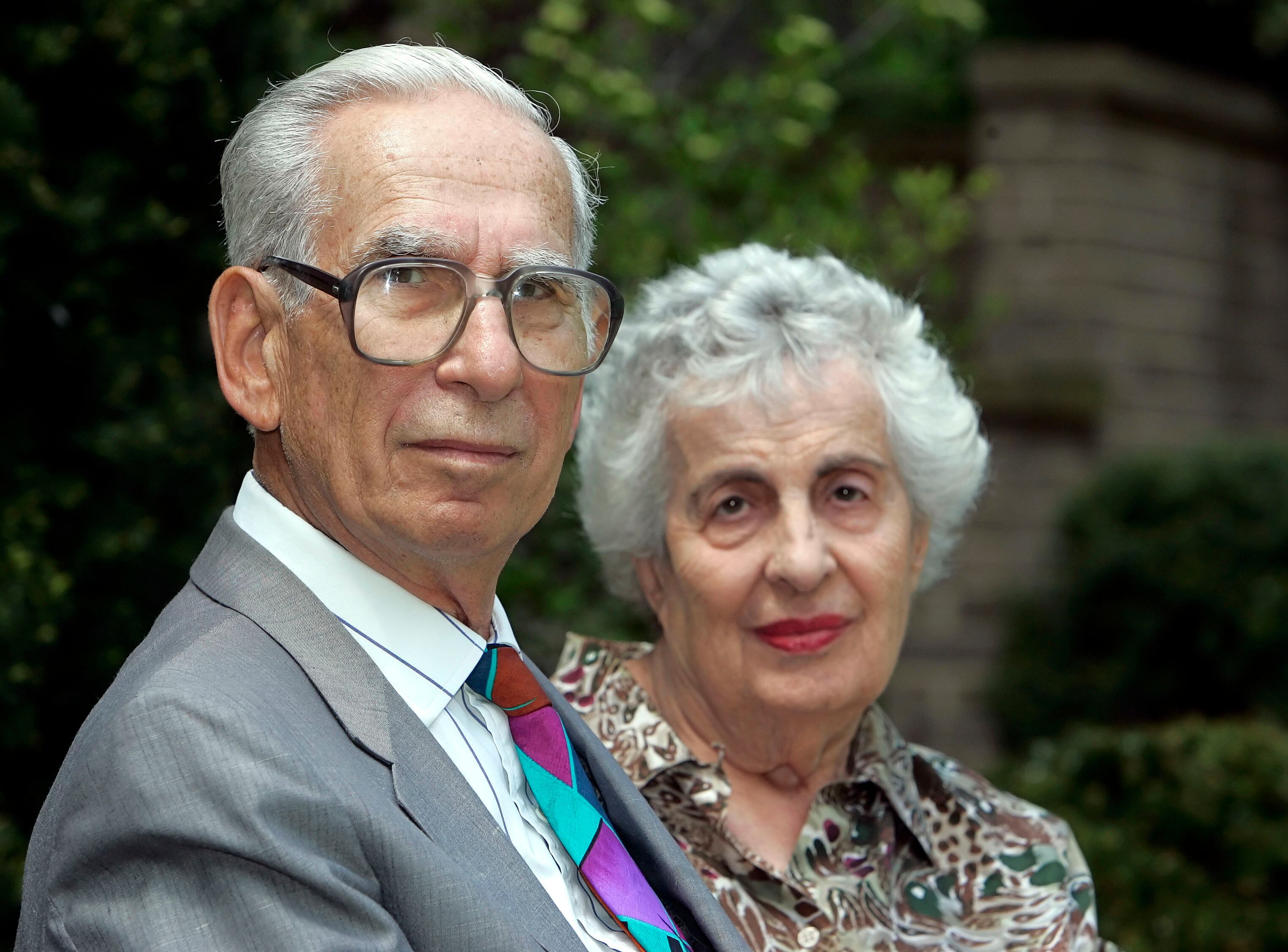 This May 10, 2005, file photo shows Claude Cassirer of San Diego with his wife, Beverly, in Cleveland Heights, Ohio. Cassirer had filed a federal court lawsuit to get back a classic painting taken from his grandmother, Lilly Cassirer, a Jewish woman who surrendered her priceless Camille Pissarro painting, "Rue St.-Honore, Apres-Midi, Effet de Pluie," to escape the Holocaust. A federal judge in Los Angeles ruled Tuesday, April 30, 2019, that the Thyssen-Bornemisza museum in Madrid that acquired the priceless, Nazi-looted painting in 1992 is the work's rightful owner.