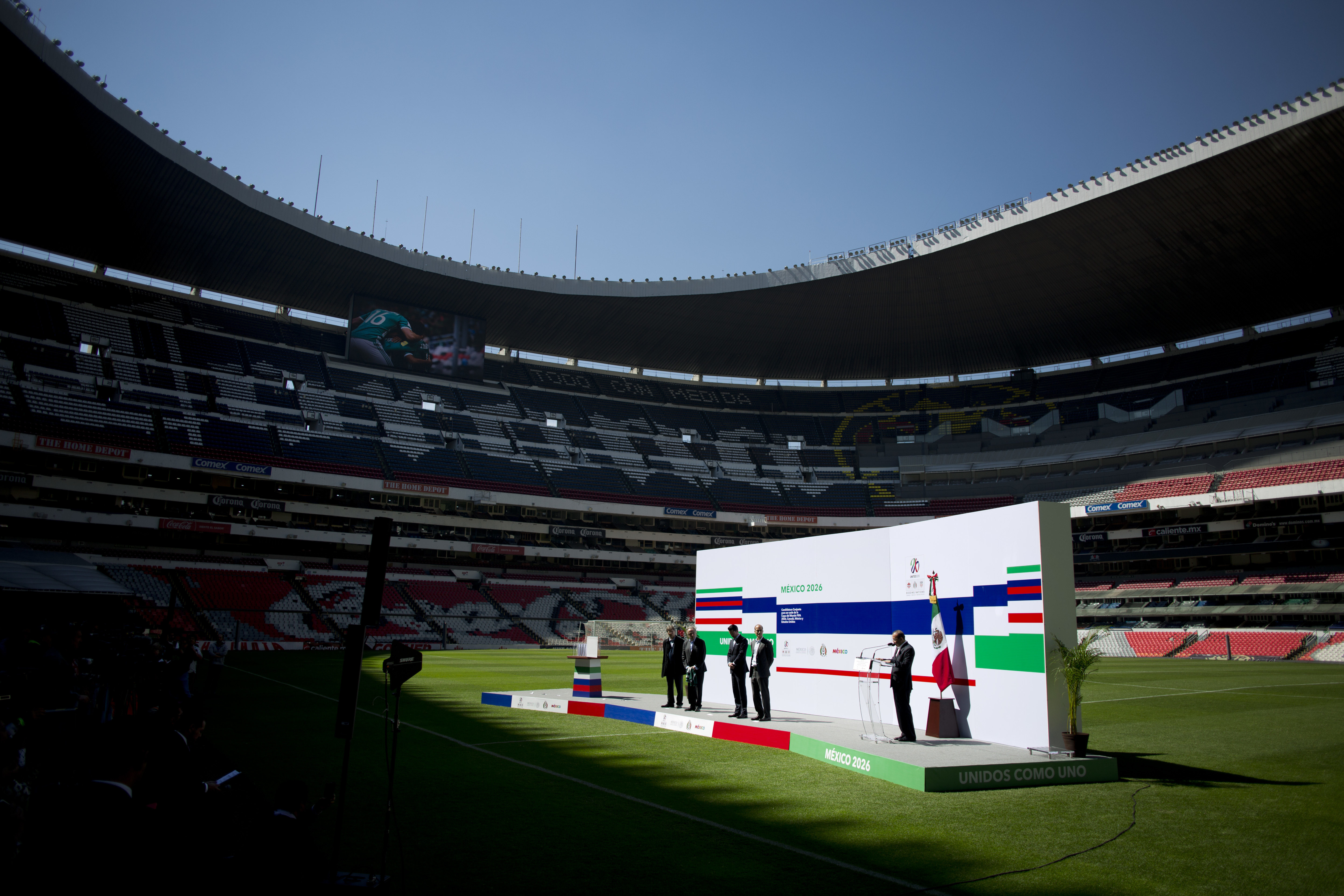 FILE - From left, Mexico Secretary of Tourism Enrique de la Madrid, President of the Mexican Football Federation Decio de Maria, Director for the Mexico World Cup candidacy Yon de Luisa, Secretary General of the Mexican Football Federation Guillermo Cantu, listen to Mexico's Interior Secretary Alfonso Navarrete Prida during the presentation of the guarantees for Mexico's bid for the 2026 Soccer World Cup, at the Estadio Azteca in Mexico City, Feb. 16, 2018. 