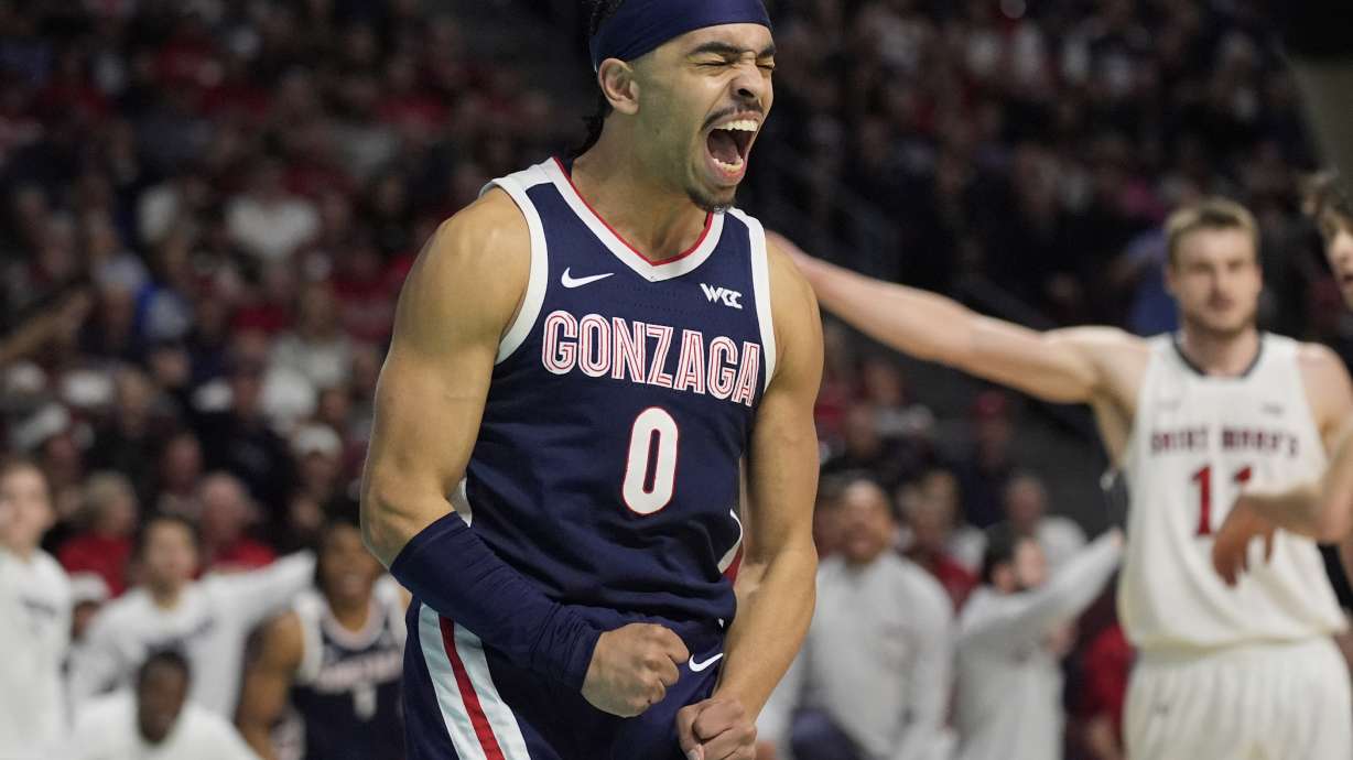 Gonzaga guard Ryan Nembhard (0) celebrates after a play against Saint Mary's during the first half of an NCAA college basketball championship game in the West Coast Conference men's tournament Tuesday, March 11, 2025, in Las Vegas.