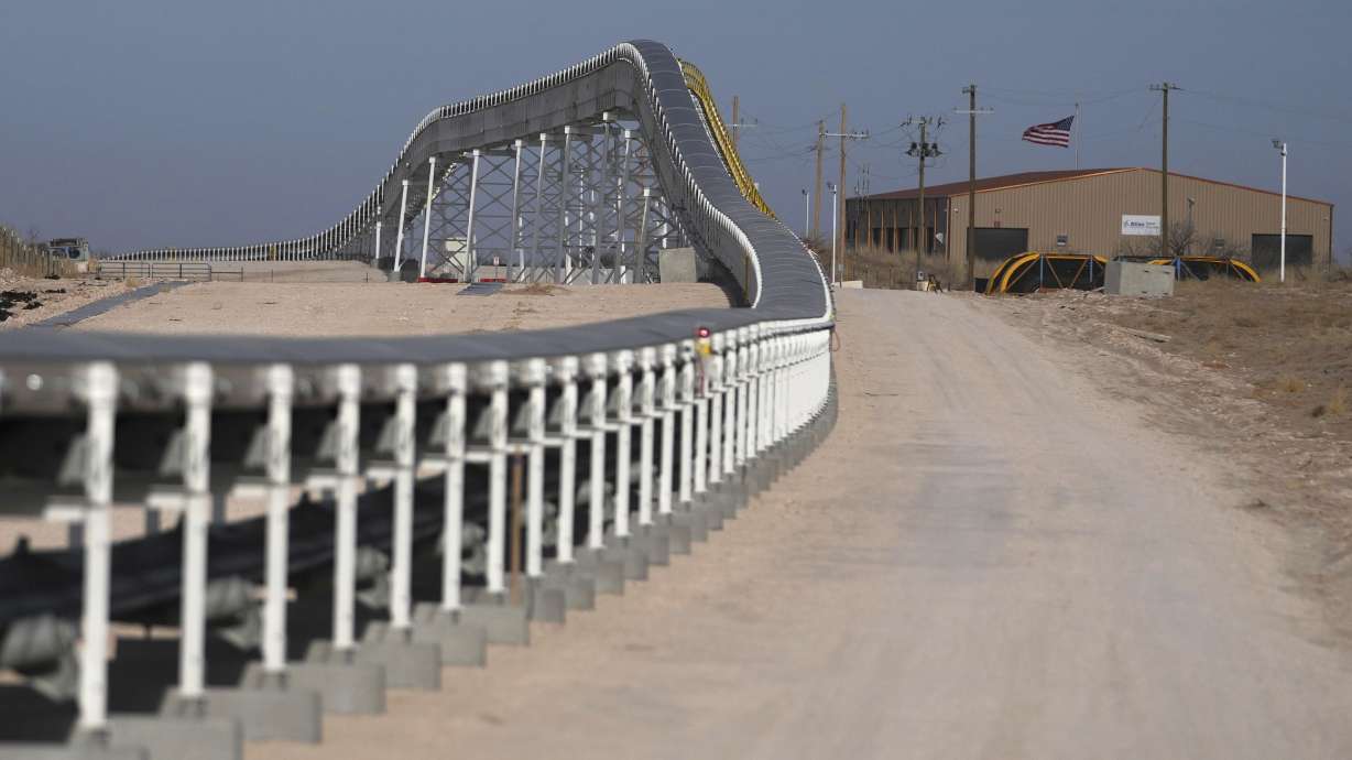 A 42-mile conveyor belt by Atlas Energy carries sand needed for hydraulic fracturing Feb. 26, in Kermit, Texas.