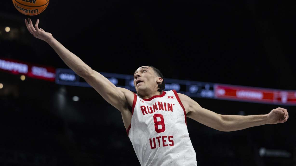 Utah Utes forward Keanu Dawes (8) reaches for a rebound during a first round game of the Big 12 Championship between the Utah Utes and the UCF Knights at the T-Mobile Center in Kansas City, Missouri, on Tuesday, March 11, 2025.