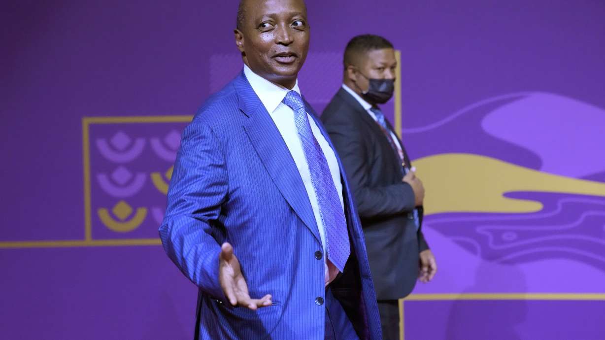 FILE - Patrice Motsepe, the President of the Confederation of African Football, arrives for the 2022 soccer World Cup draw at the Doha Exhibition and Convention Center in Doha, Qatar, on April 1, 2022.