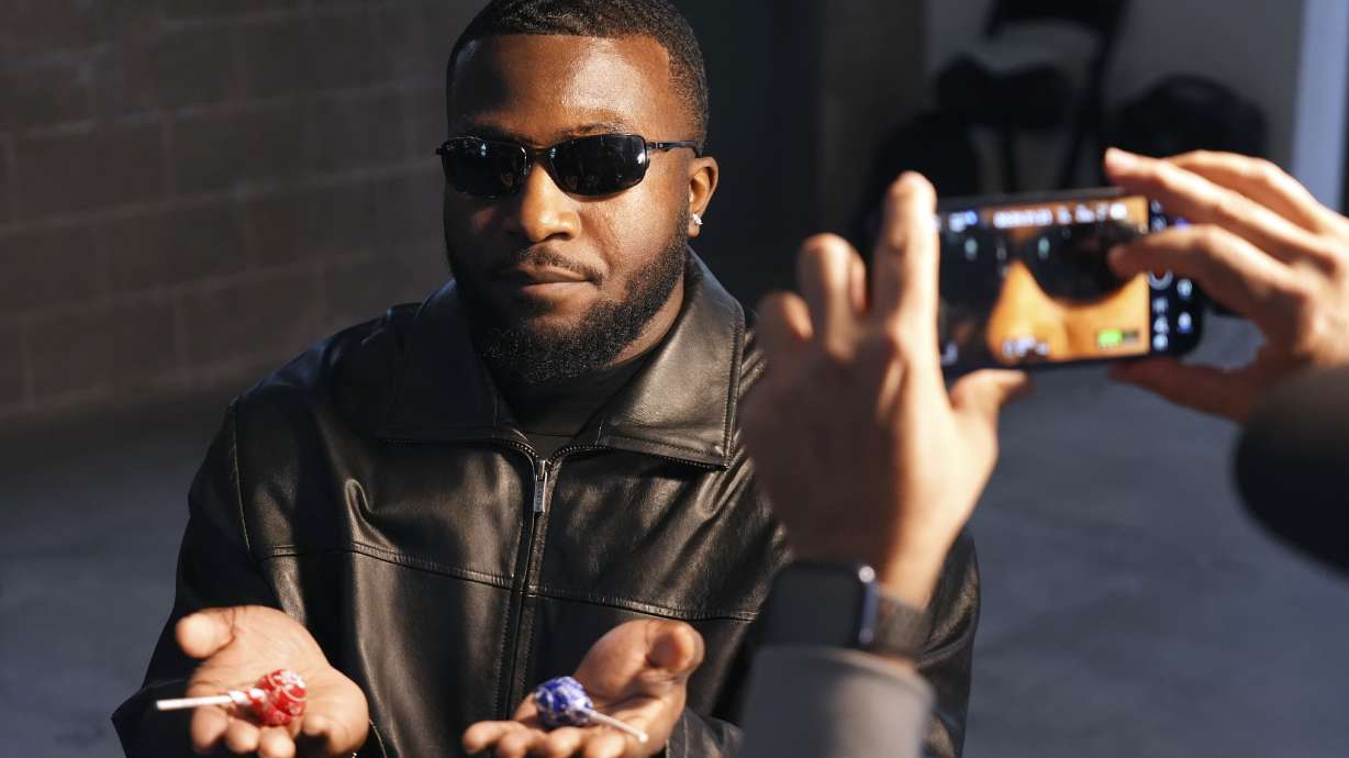 Isaac Ukwu, a defensive end for the Detroit Lions, acts out a scene from "The Matrix" during a filmmaking workshop for NFL players on Tuesday, March 4, 2025, in Santa Monica, Calif.