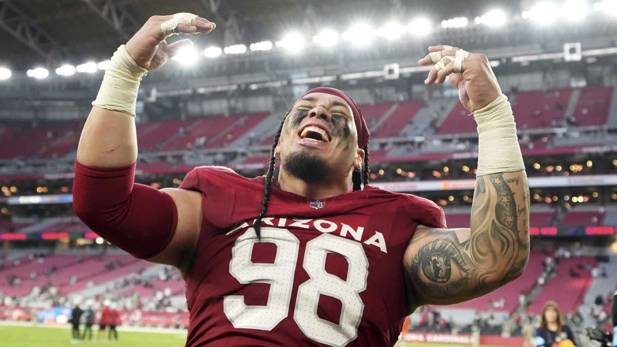 FILE - Arizona Cardinals defensive tackle Roy Lopez celebrates after an NFL football game against the New York Jets, Nov. 10, 2024, in Glendale, Ariz.