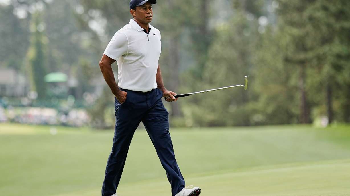FILE - Tiger Woods walks on the first hole during the first round of the Masters golf tournament at Augusta National Golf Club on Thursday, April 6, 2023, in Augusta, Ga.