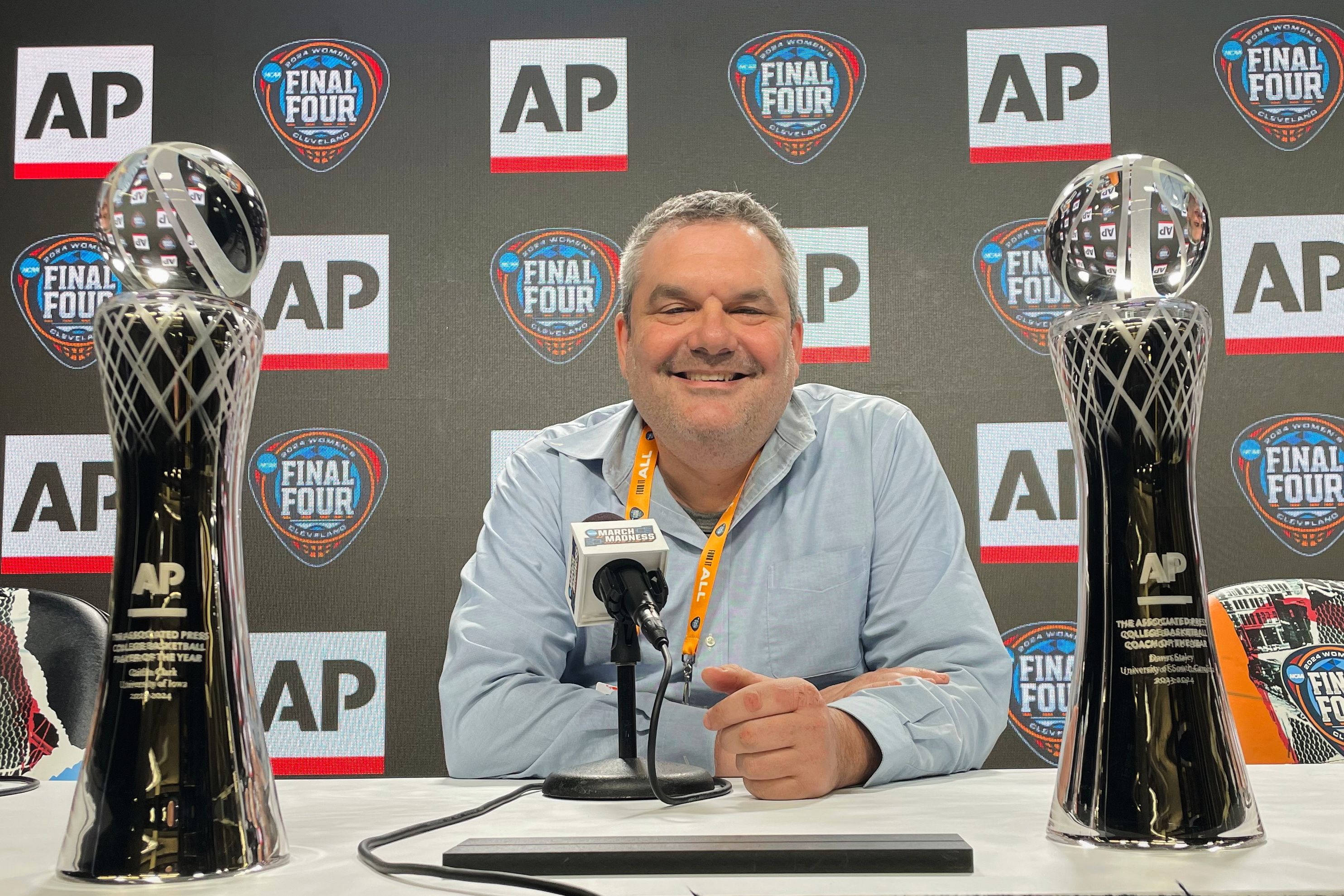 Associated Press basketball writer Doug Feinberg poses at the Women's Final Four NCAA college basketball tournament, Thursday, April 4, 2024, in Cleveland. Feinberg, who has covered the women’s basketball for nearly 20 years, has been chosen for the U.S. Basketball Writers Association Hall of Fame Class of 2025. 