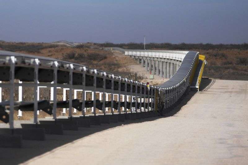 A 42-mile conveyor belt by Atlas Energy carries sand needed for hydraulic fracturing Feb. 26 in Kermit, Texas.