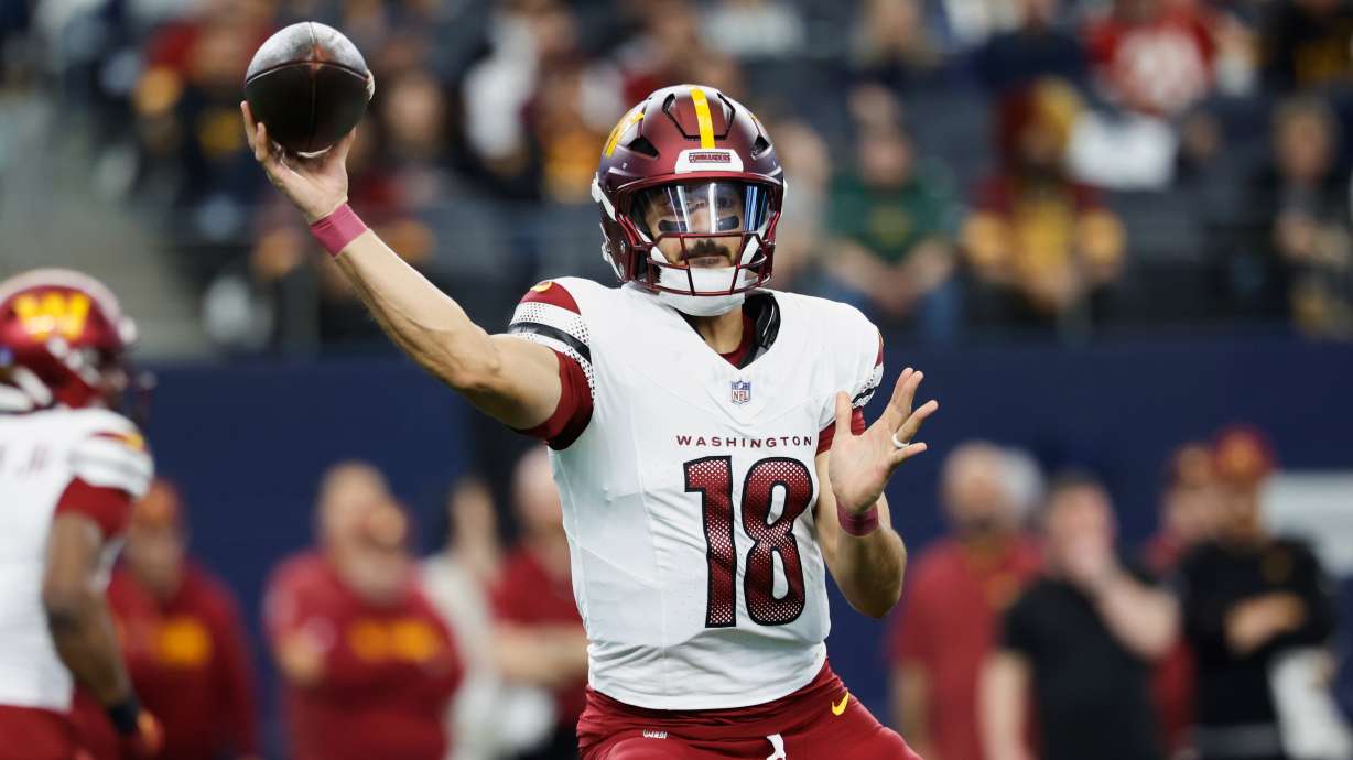 FILE - Washington Commanders quarterback Marcus Mariota (18) looks to pass during a NFL football game against the Dallas Cowboys on Sunday, Jan. 5, 2025, in Arlington, Texas.