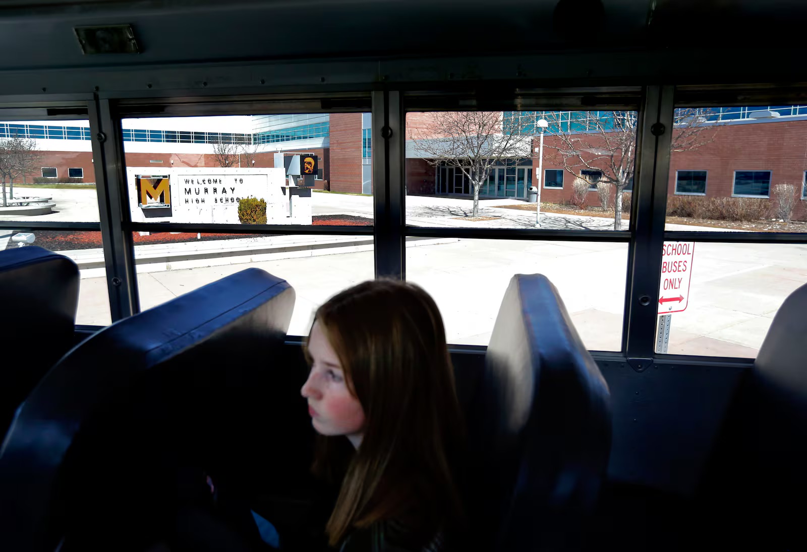 Sophomore Zoe Scott waits for her bus to leave Murray High School on March 12, 2020.