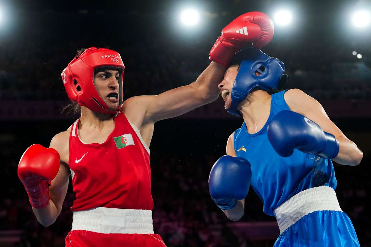 Algeria's Imane Khelif, left, fights China's Yang Liu in their women's 66 kg final boxing match at the 2024 Summer Olympics, Aug. 9, 2024, in Paris, France.