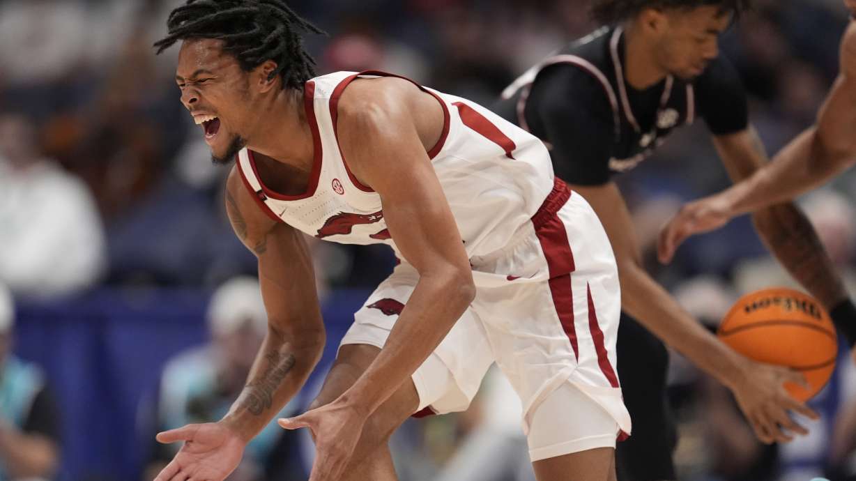 Arkansas guard D.J. Wagner (21) reacts to play against South Carolina during the second half of an NCAA college basketball game at the Southeastern Conference tournament, Wednesday, March 12, 2025, in Nashville, Tenn.