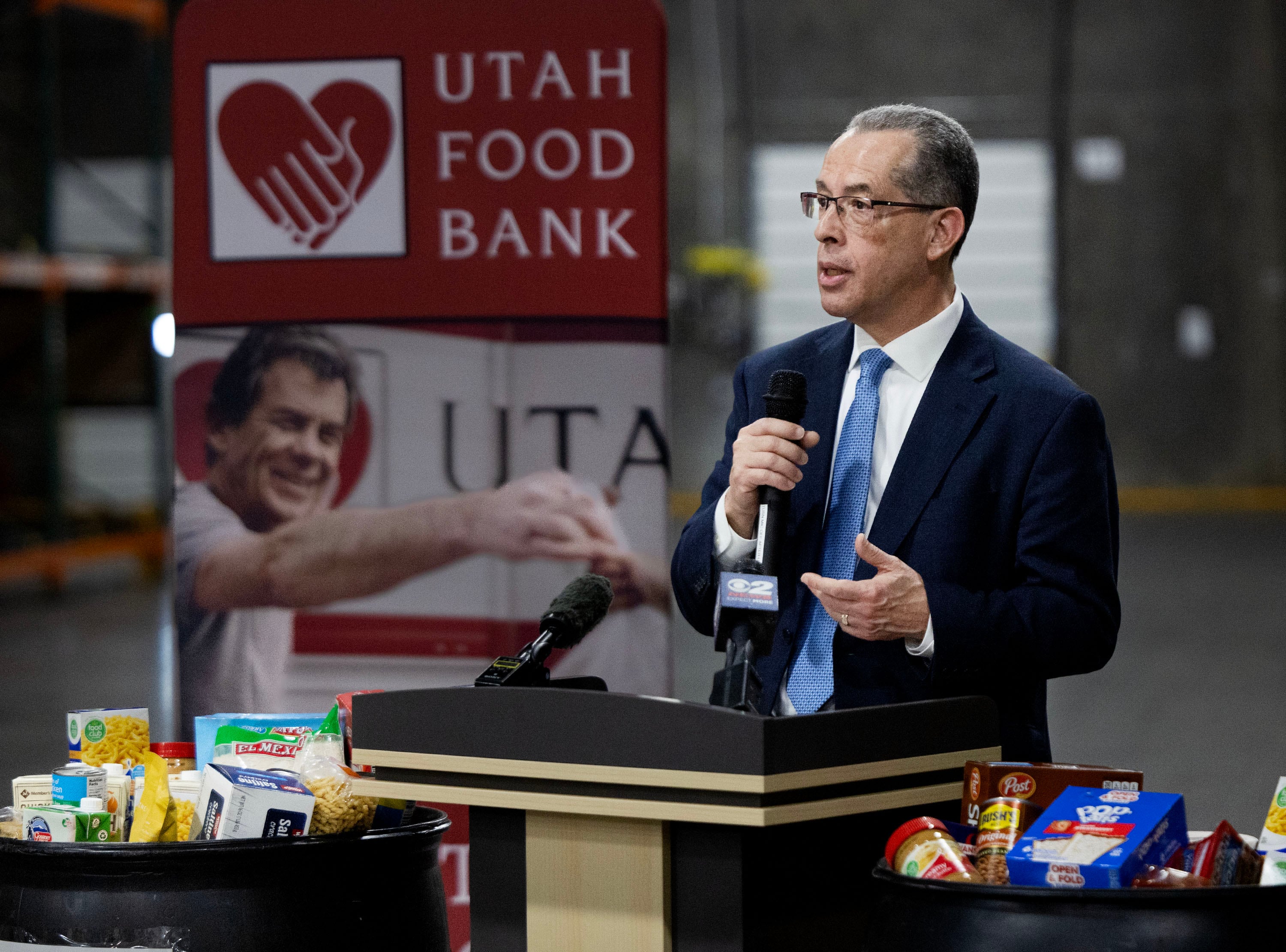 Elder Hugo Martinez, first counselor of the Utah Area Presidency with The Church of Jesus Christ of Latter-day Saints, speaks at the kickoff of the Feed Utah food drive at the Utah Food Bank in South Salt Lake on Wednesday. The Utah Food Bank is collecting nonperishable food donations Saturday, March 15, for its statewide Feed Utah food drive.