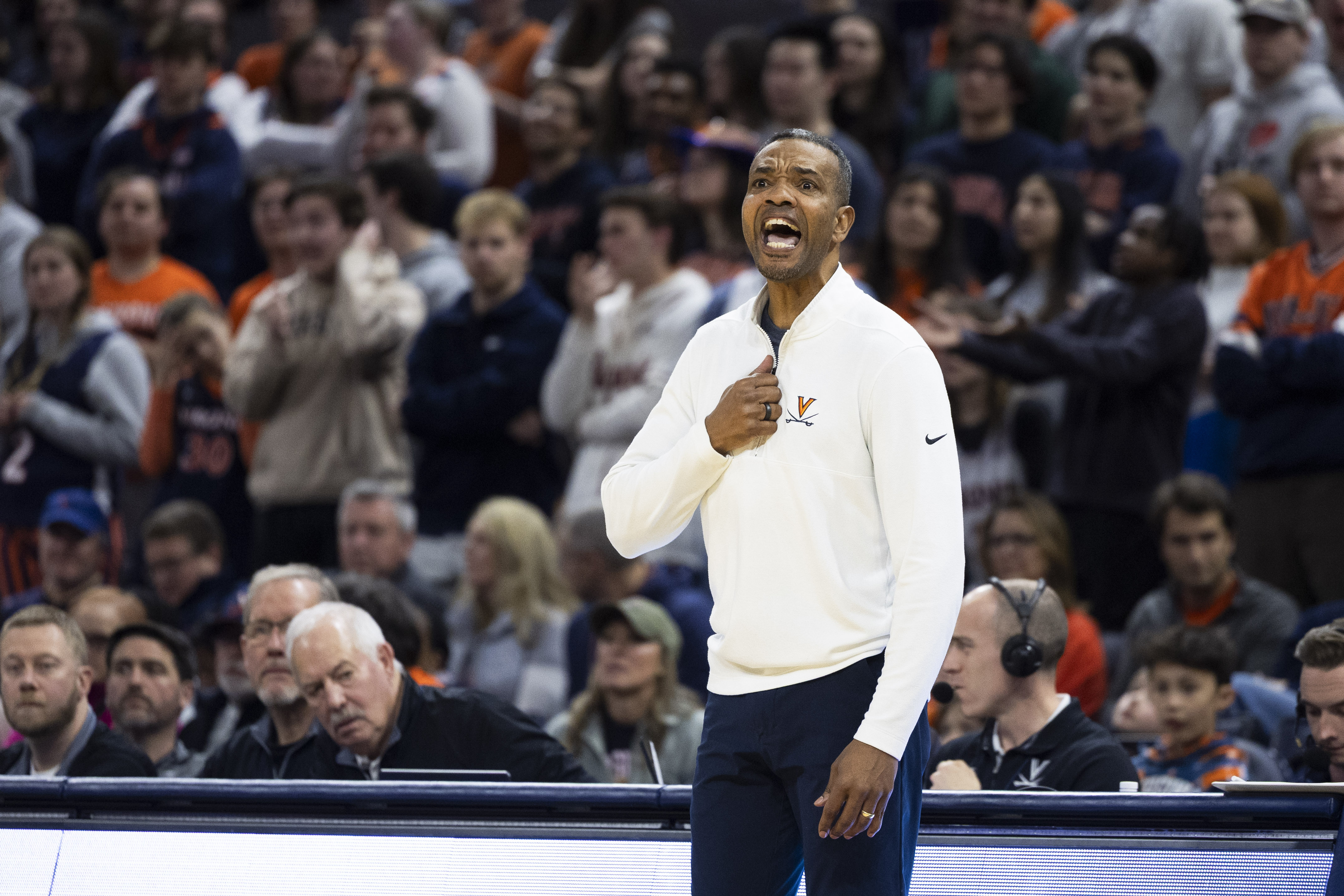 Virginia head coach Ron Sanchez yells to his players during the first half of an NCAA college basketball game against Duke, Monday, Feb. 17, 2025, in Charlottesville, Va. 