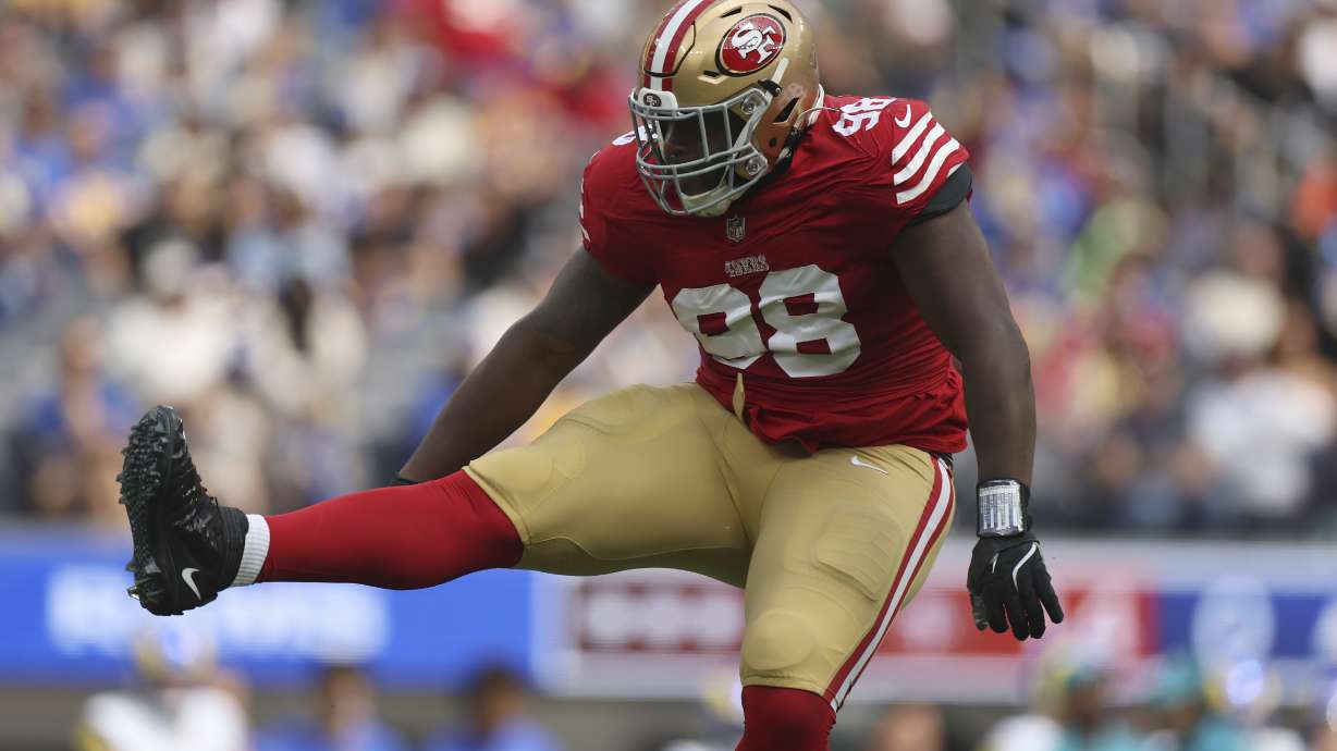 FILE - San Francisco 49ers defensive tackle Javon Hargrave (98) celebrates after sacking Los Angeles Rams quarterback Matthew Stafford during the first half of an NFL football game, Sept. 22, 2024, in Inglewood, Calif.