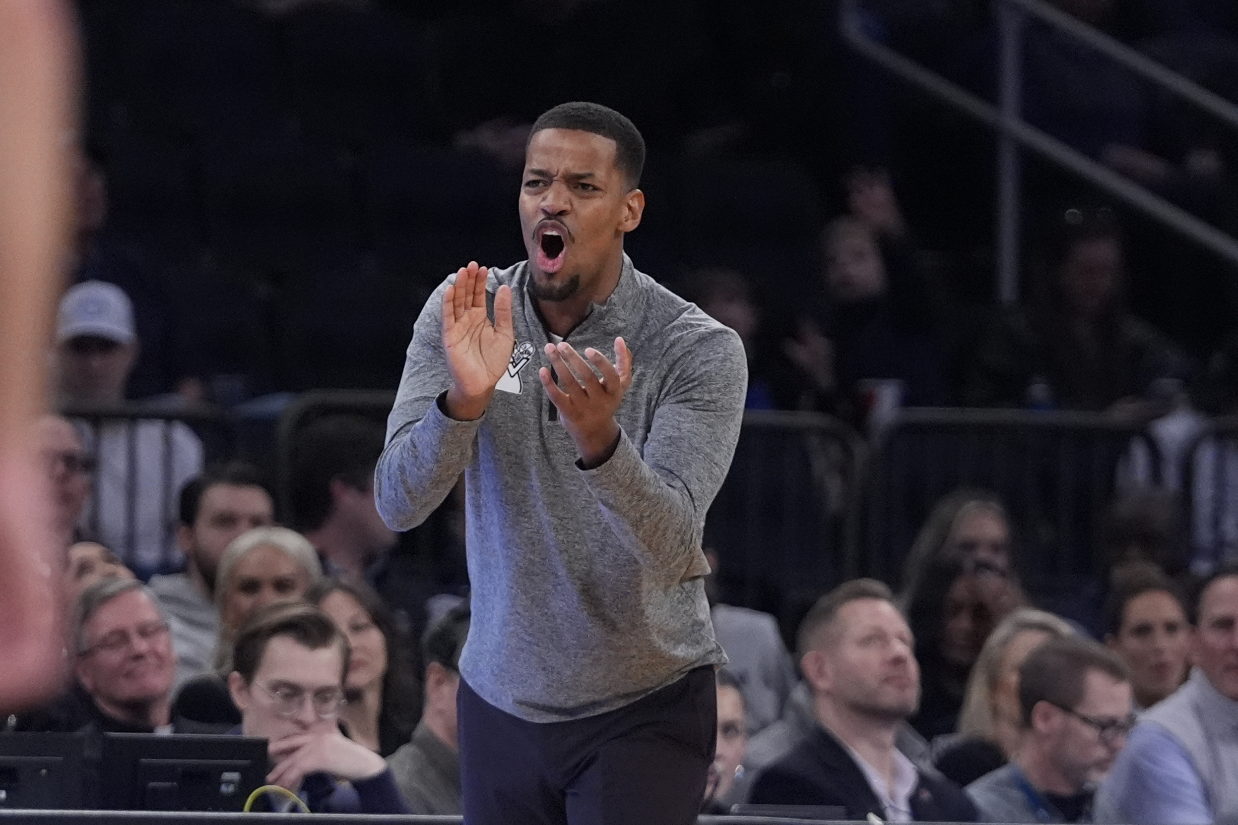 Providence head coach Kim English calls out to his team during the first half of an NCAA college basketball game against Butler at the Big East basketball tournament Wednesday, March 12, 2025, in New York. 