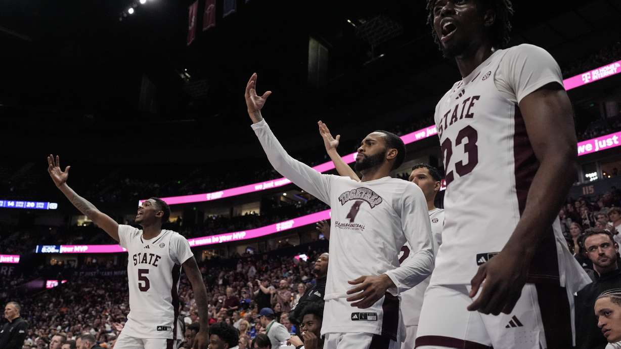 Mississippi State players celebrate a win over LSU after an NCAA college basketball game at the Southeastern Conference tournament, Wednesday, March 12, 2025, in Nashville, Tenn.