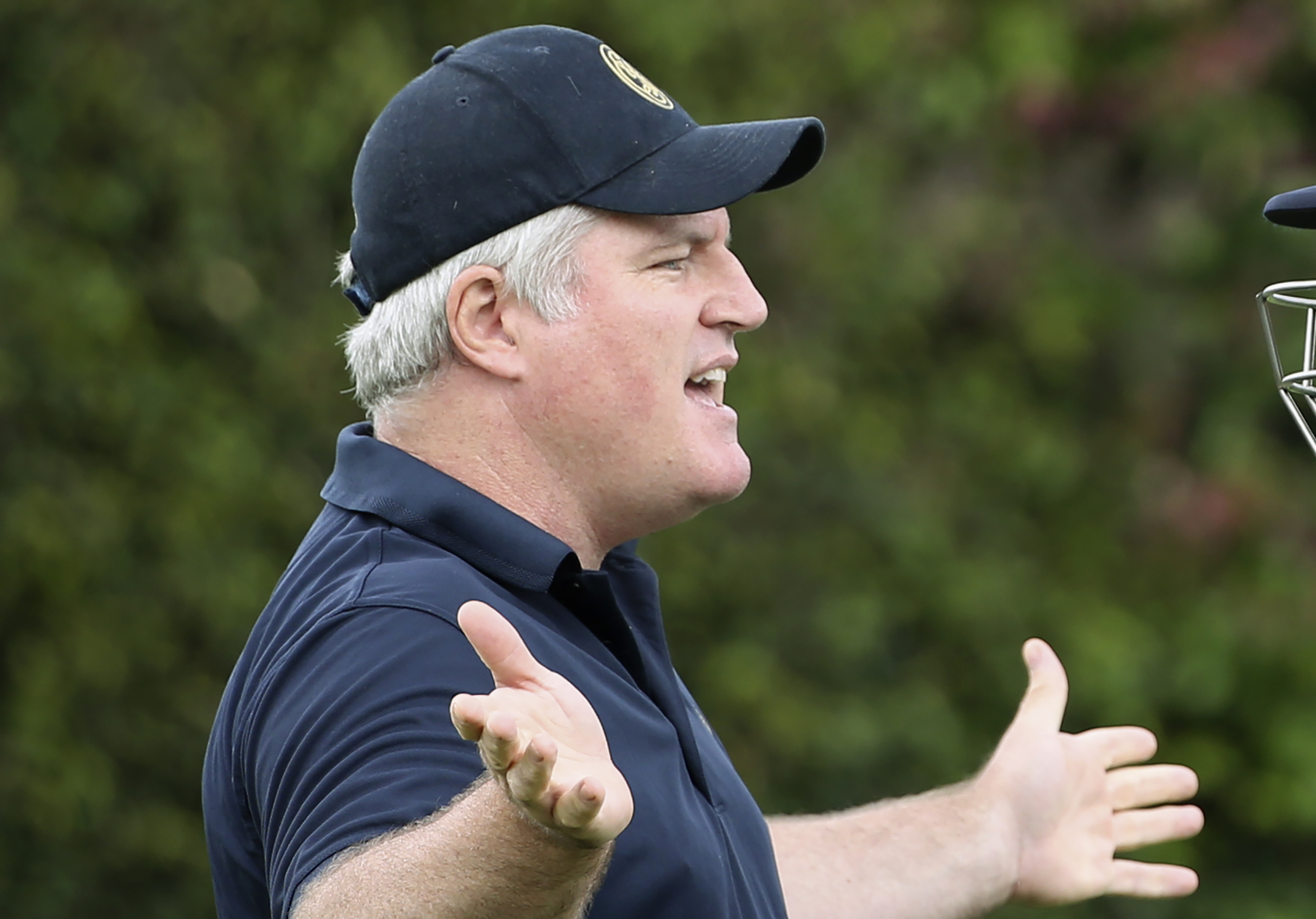 FILE - In this Jan. 3, 2018, file photo, former Australian spin bowler Stuart MacGill helps England's team while training for their cricket test match against Australia in Sydney. 