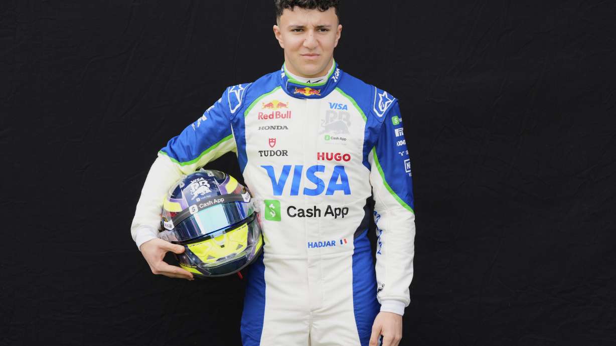 Team RB driver Isack Hadjar of France poses for the drivers portrait photo session ahead of the Australian Formula One Grand Prix at Albert Park, in Melbourne, Australia, Thursday, March 13, 2025.