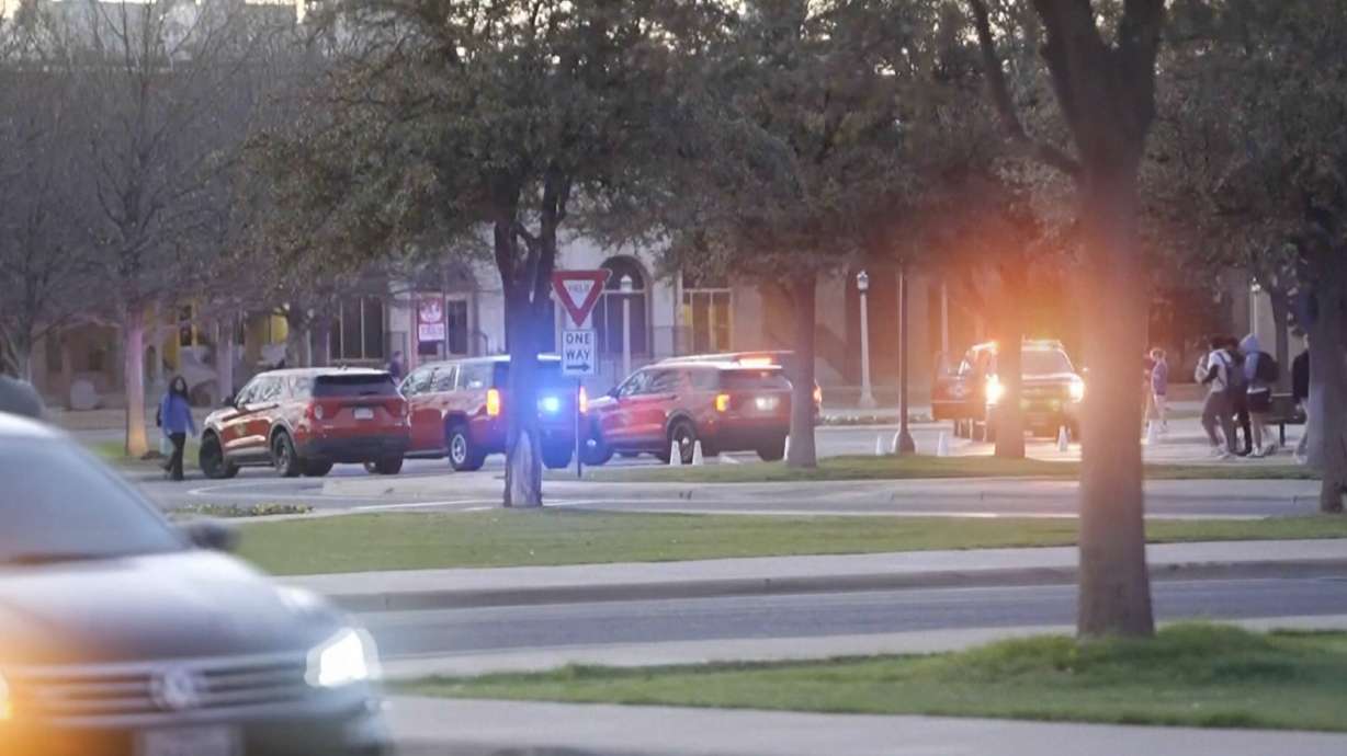This screen grab taken from video provided by KAMC on Wednesday shows traffic on campus at the Texas Tech University campus in Lubbock.