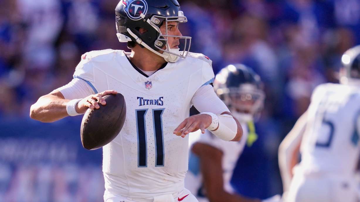 FILE - Tennessee Titans quarterback Mason Rudolph (11) looks to throw during an NFL football game against the Buffalo Bills, Sunday, Oct. 20, 2024, in Orchard Park, N.Y.