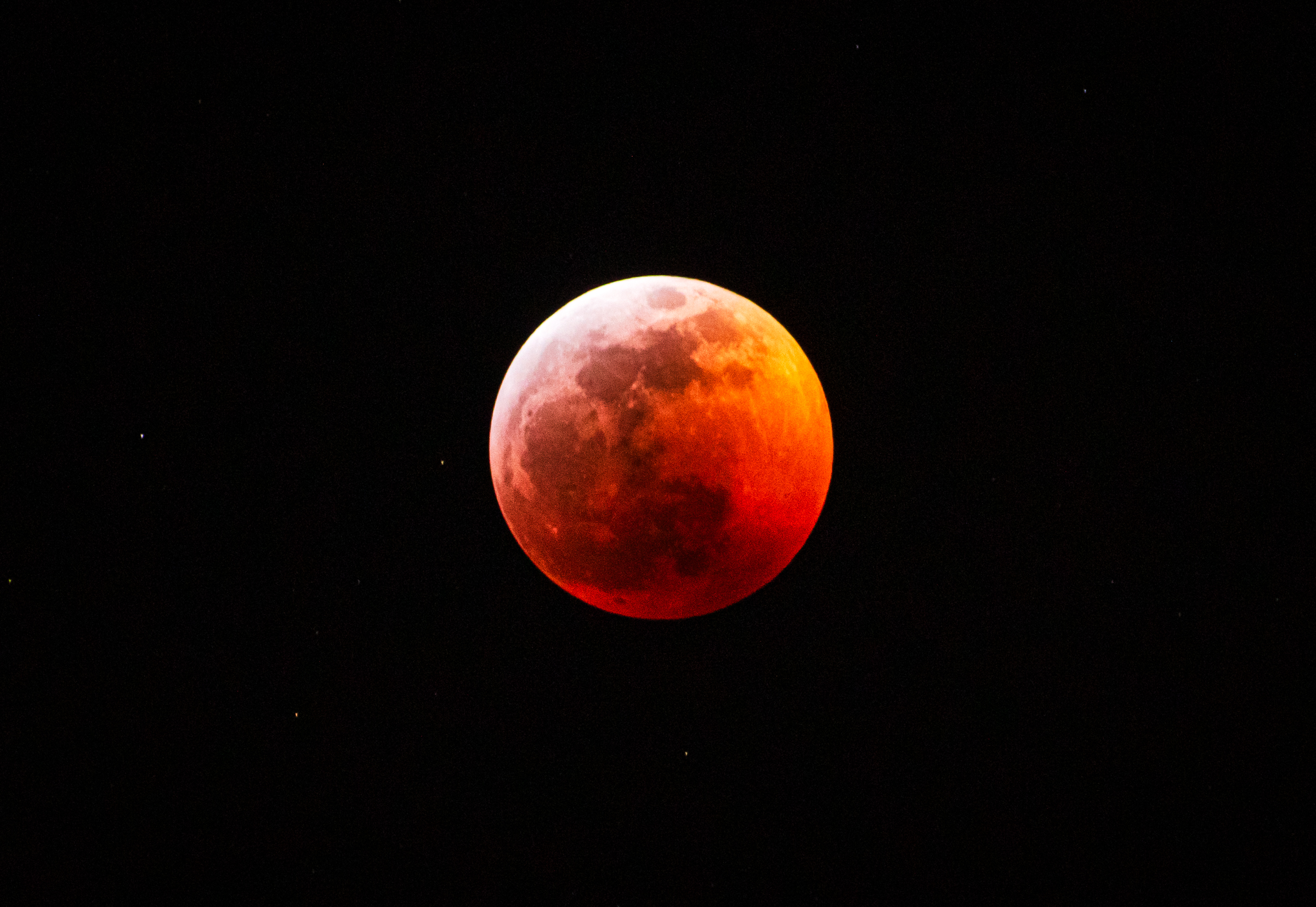 A lunar eclipse over Salt Lake City on Jan. 20, 2019. Another total lunar eclipse will take place early Tuesday, but some Utahns will have a better chance to view it than others.