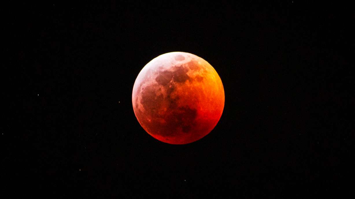 A lunar eclipse over Salt Lake City on Jan. 20, 2019. The first lunar eclipse over the U.S. since 2022 will take place between Thursday night and Friday morning, but many Utahns may find it difficult to view.